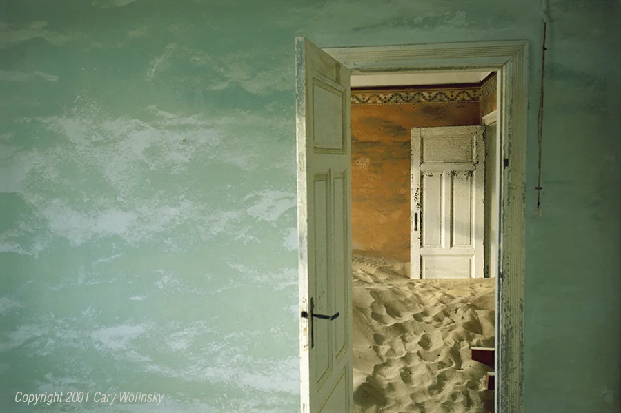  Sand House Series,  The Green Room. Kolmanskop, near Luderitz, Namibia, 2001:  I stumbled upon Kolmanskop, an abandoned mining town near Luderitz while working on a story about diamonds for the National Geographic Magazine. In 1908, Namibia was st