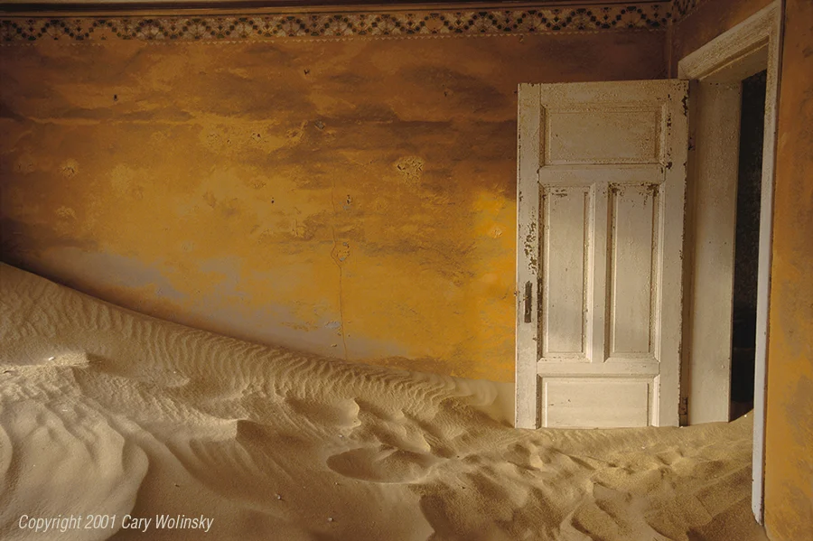  Sand House Series, The Sienna Room: Kolmanskop, near Luderitz, Namibia, 2001:  I stumbled upon Kolmanskop, an abandoned mining town near Luderitz while working on a story about diamonds for the National Geographic Magazine. In 1908, Namibia was st
