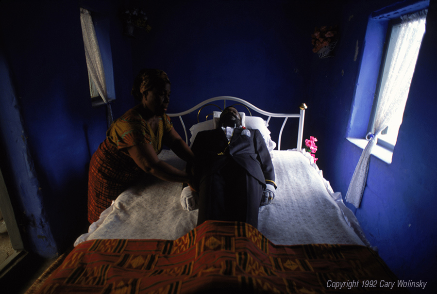 A woman prepares a body for burial in Accra, Ghana, Africa. 