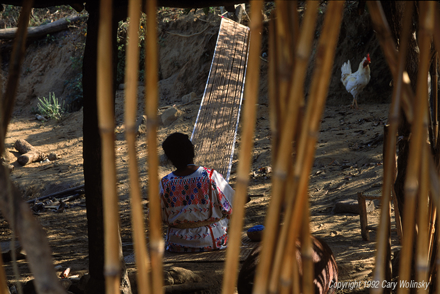 Maura De Jesus Lopez weaving a huipil on a backstrap loom in Xochistlahuaca, Guerrero, Mexico 