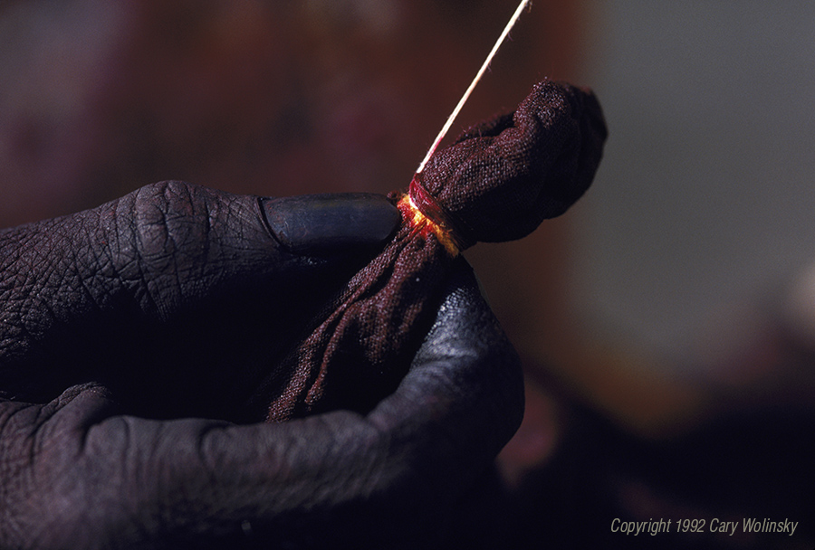 The fingers of tie dye craftsman Taiyab Mamad in Dhamadka near Bhuj, Kutch, India 