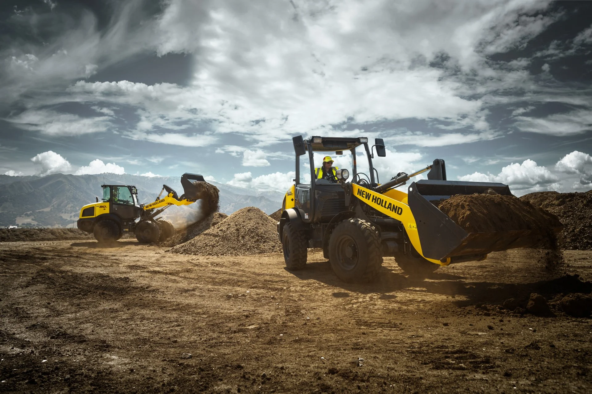 21 - NH_W80C_&_W50C_Scooping_Dirt_Heavy.jpeg