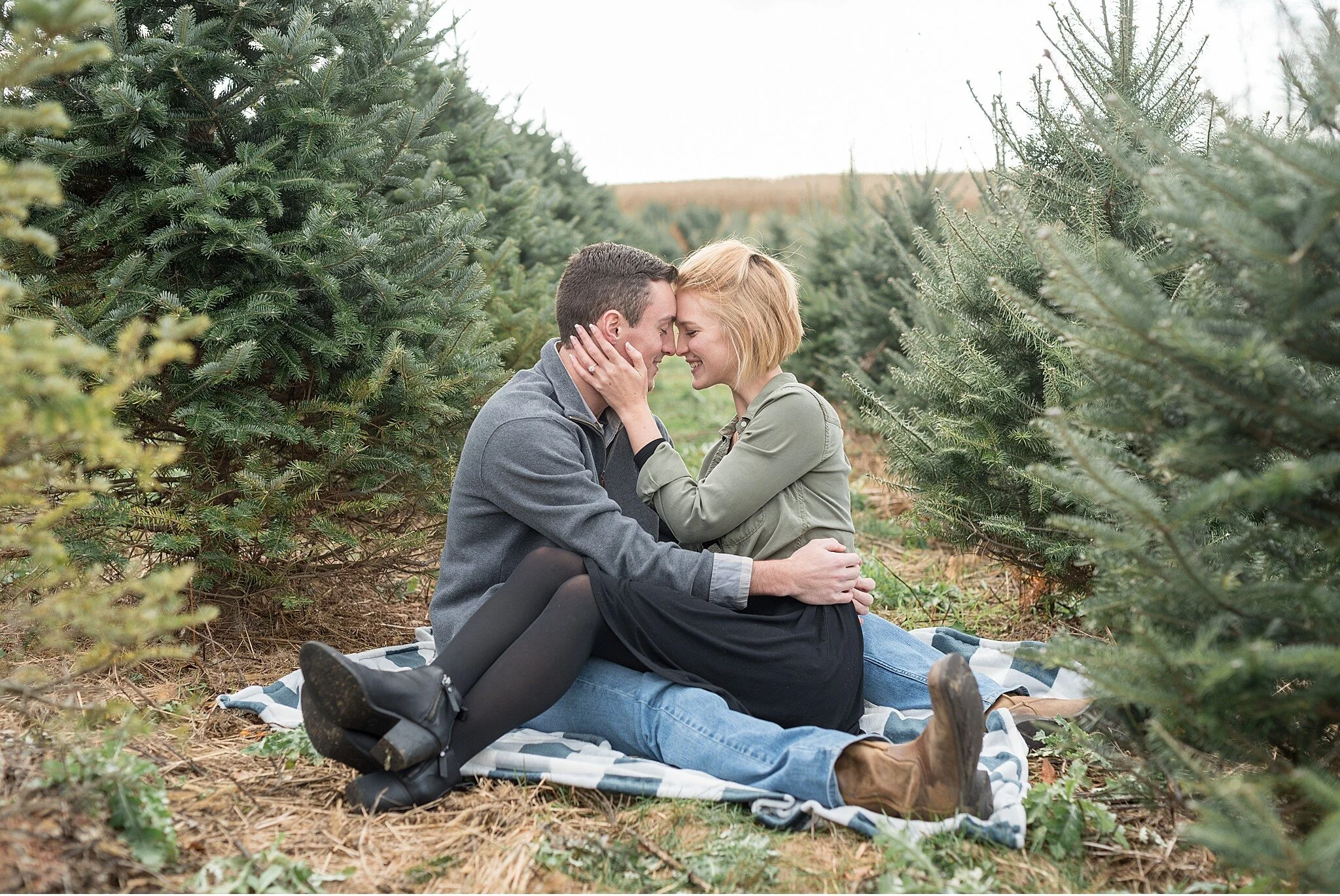 Kristi and Dustin Lancaster Christmas Tree Farm Engagement