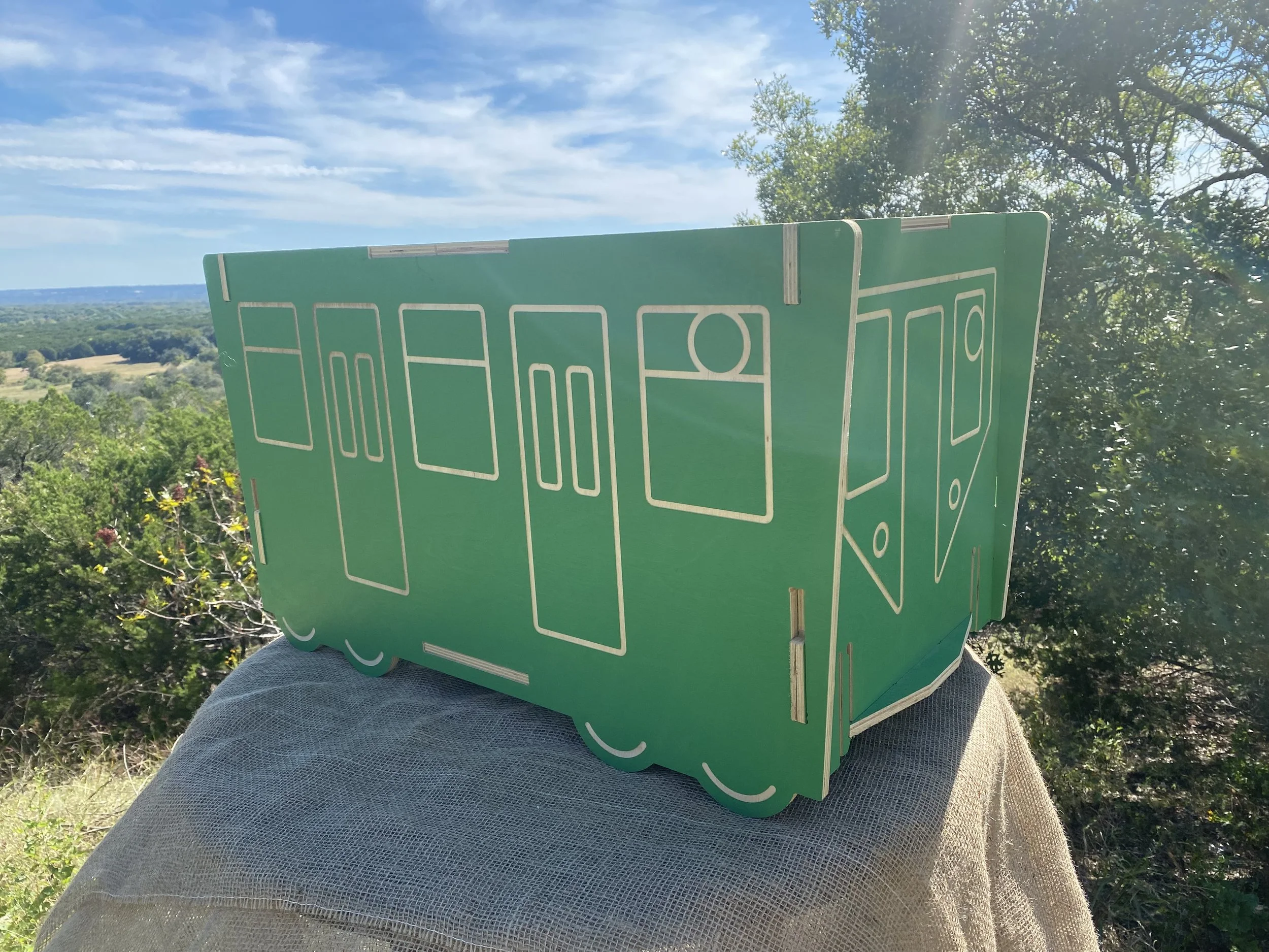  Each side features whimsical millwork, revealing the tone of the natural wood 