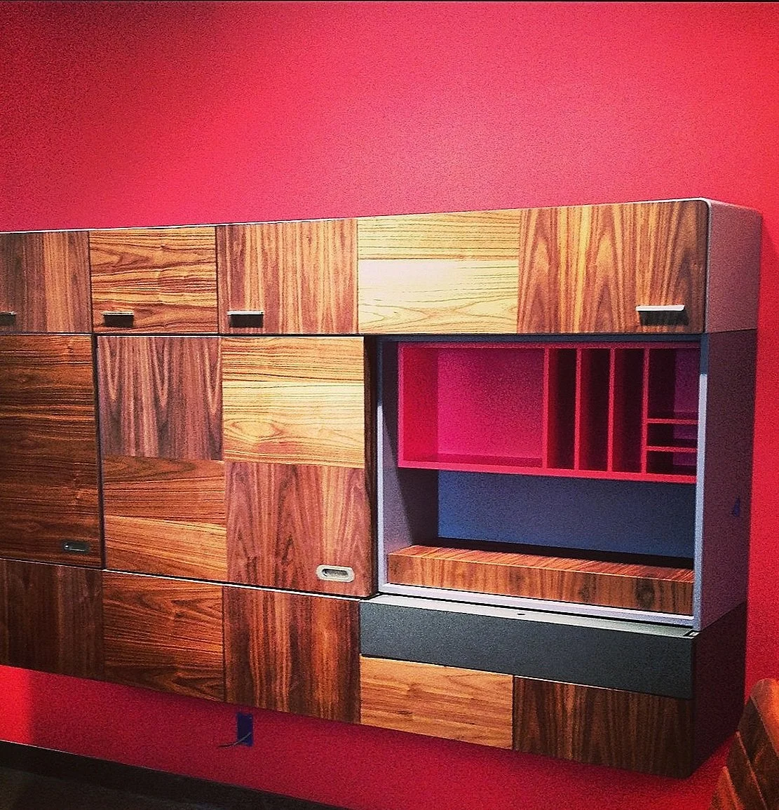 Floating walnut cabinet system with writing desk and cocktail bar, fabricated for NYC firm  Doban Architecture  