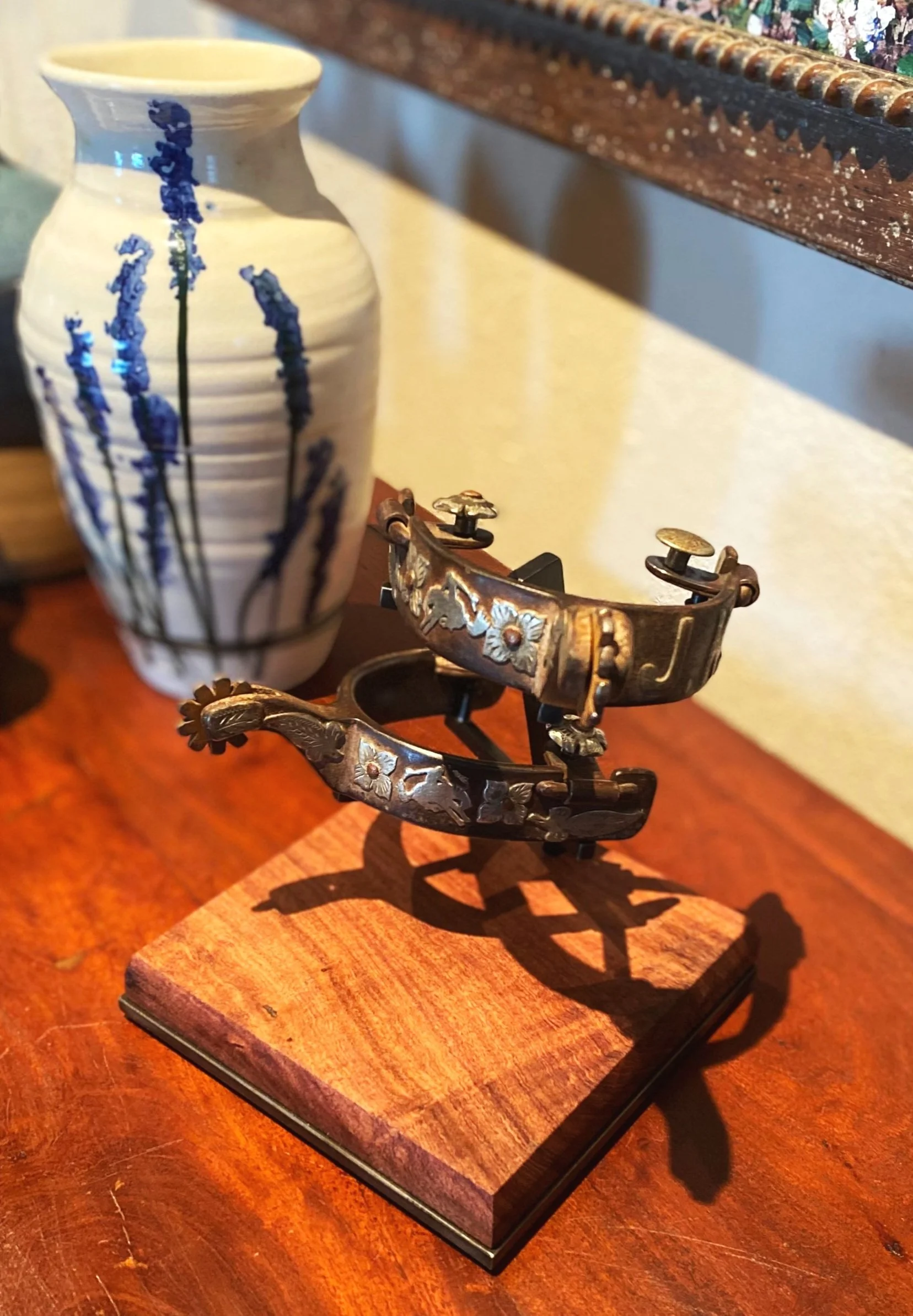  Museum-quality spur display made with blackened-steel on a beveled mesquite pedestal, designed and welded for collectors in Texas and Colorado 