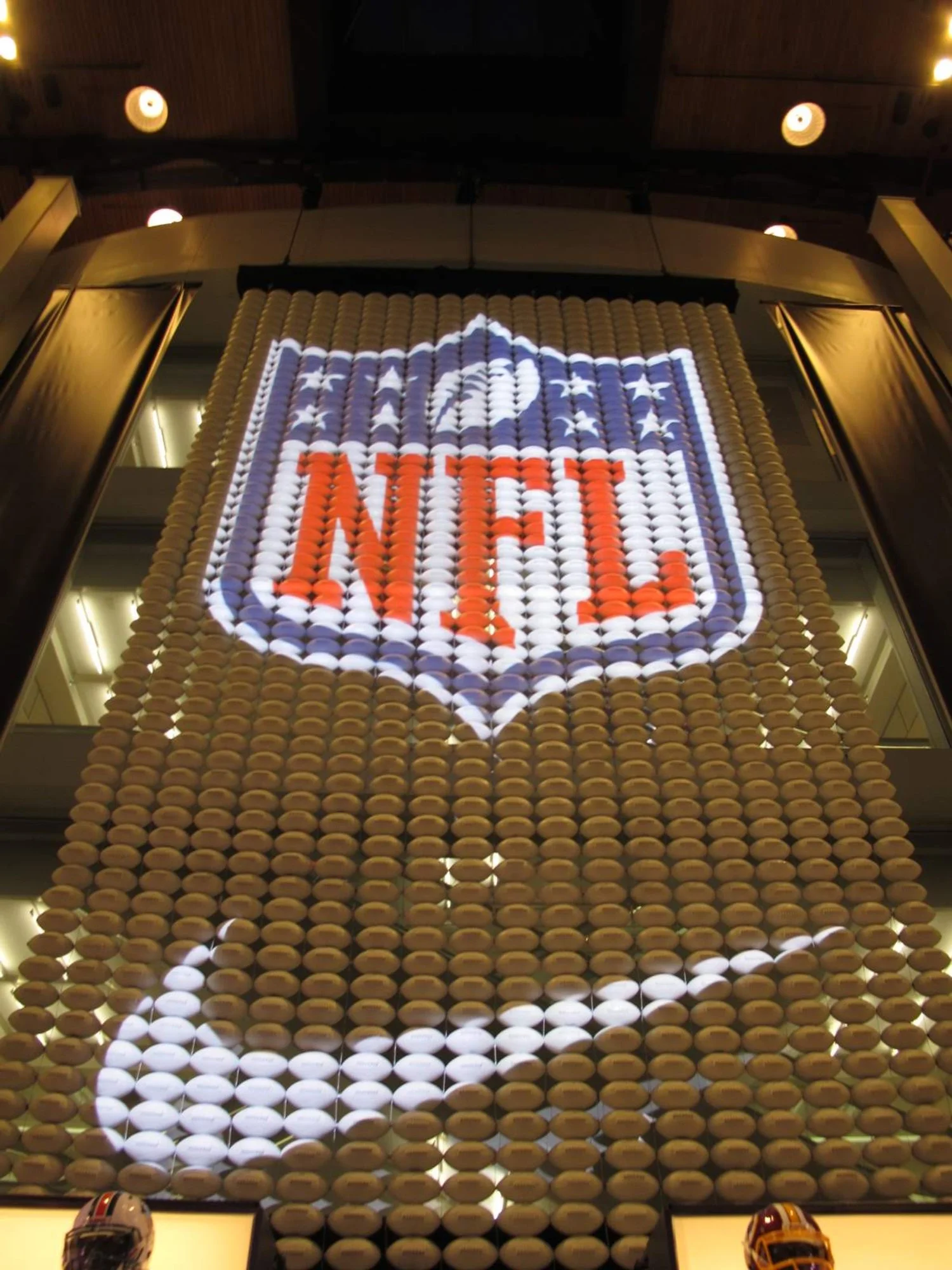  A three-story screen made of regulation footballs, engineered and crafted for the  Nike flagship on Manhattan’s Fifth Avenue  