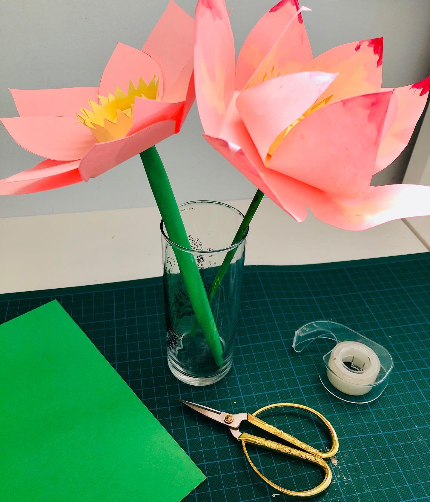 Teaching children how to make a simple lotus flower on zoom. Just find yourself some paper, scissors, glue and tape. #papercrafts #kidsactivities #paperflowers