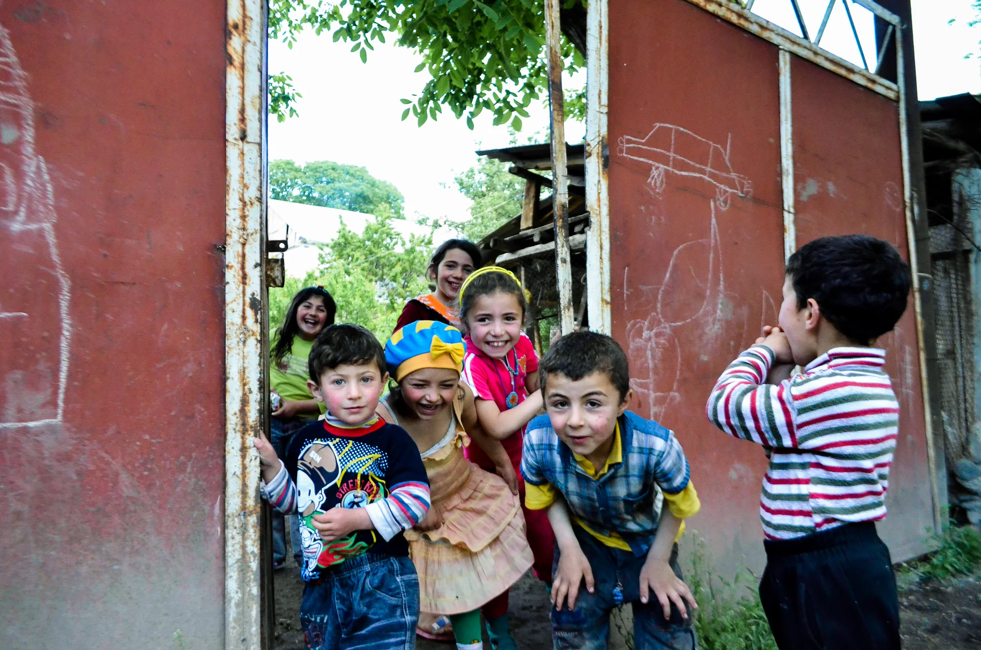 Some children giggle at the site of foreigner in the mountain village of Garatomb.