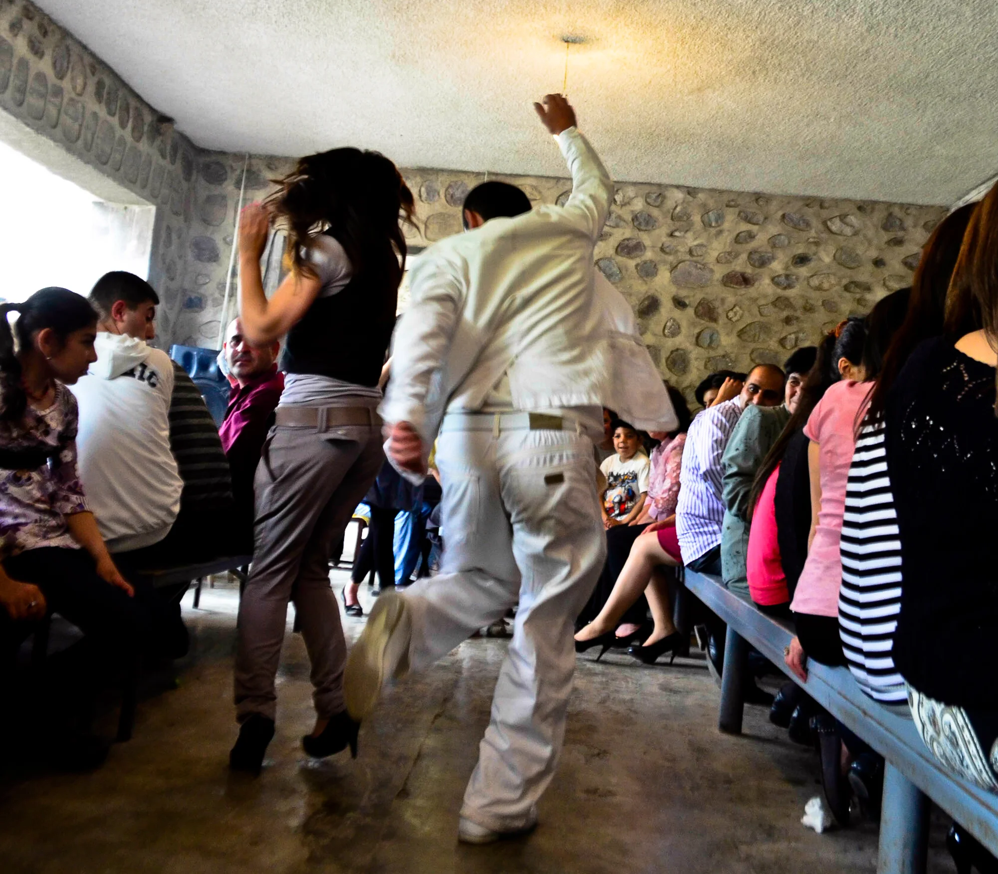 Celebrations at the christening of a child near the village of Khndzoresk, in the South of Armenia.