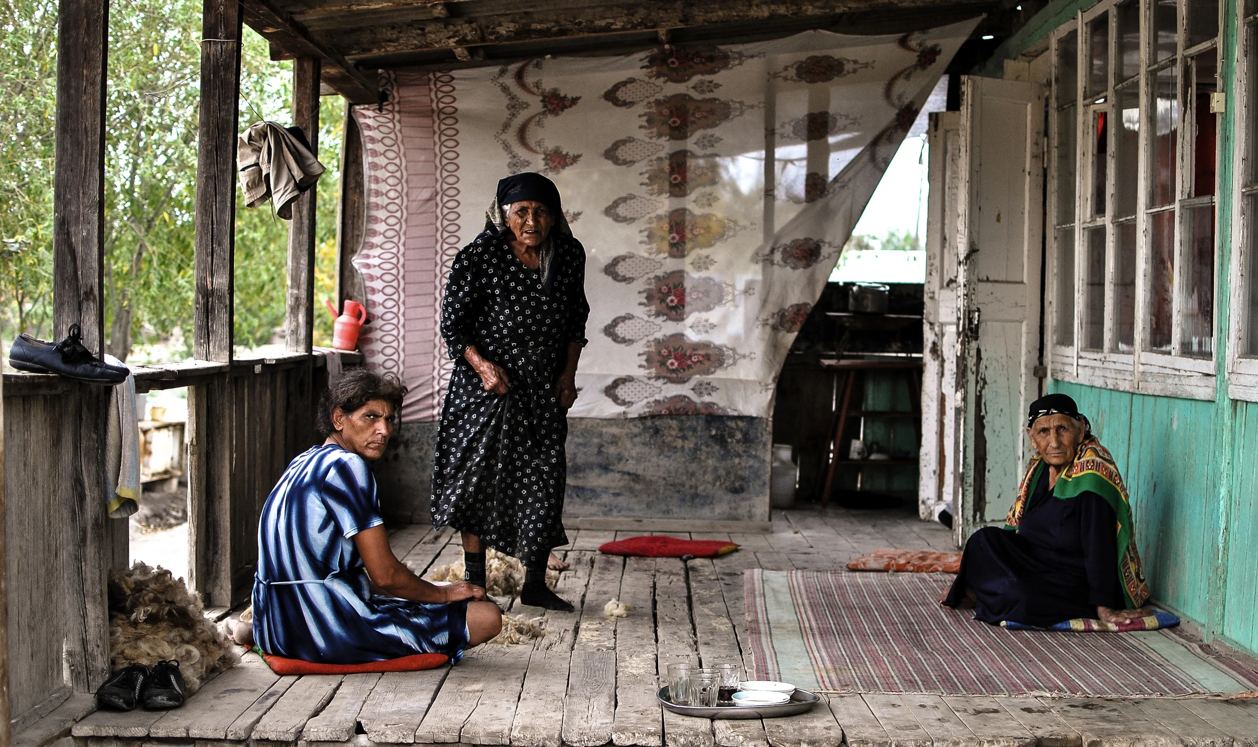 Women on the patio of their flood ravaged home in the village of Sabirabad, Azerbaijan.