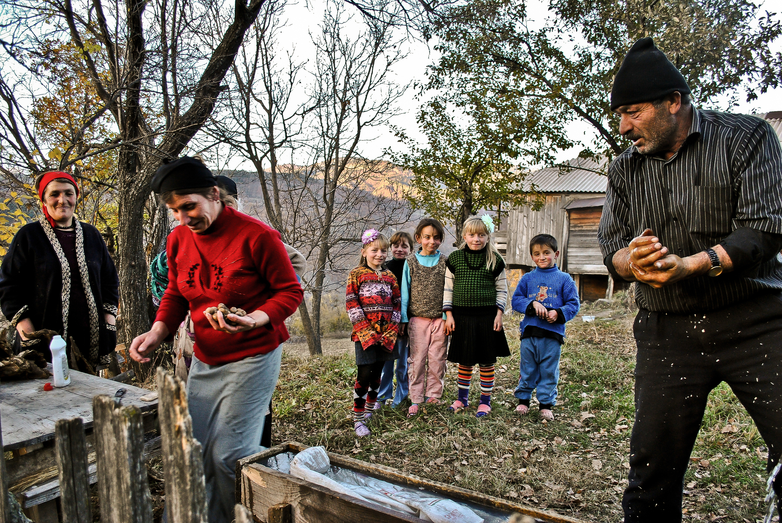 Villagers from Zarzma, Georgia fetching a handful of nuts as a gift to a passerby (me).