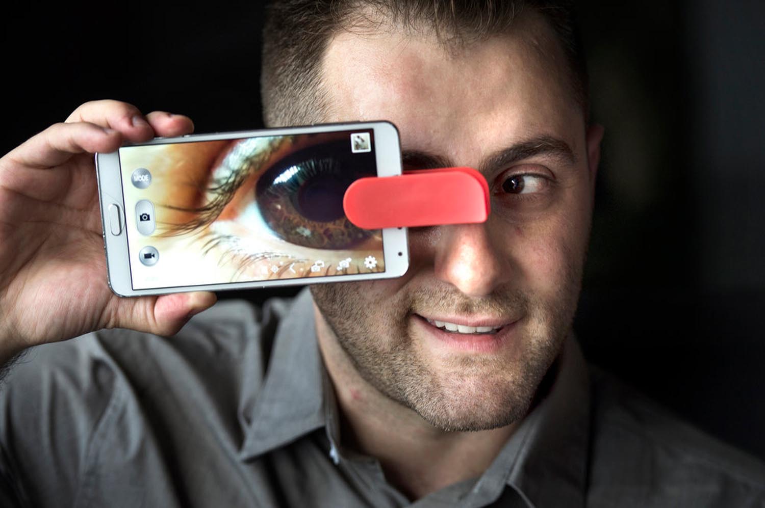  Aris Allahverdian, inventor, CEO of Mobi-Lens, shows his product. The lenses (wide angle, fish eye, macro) clip on to any smart device. The universal design fits over any smart device on front or back camera. 