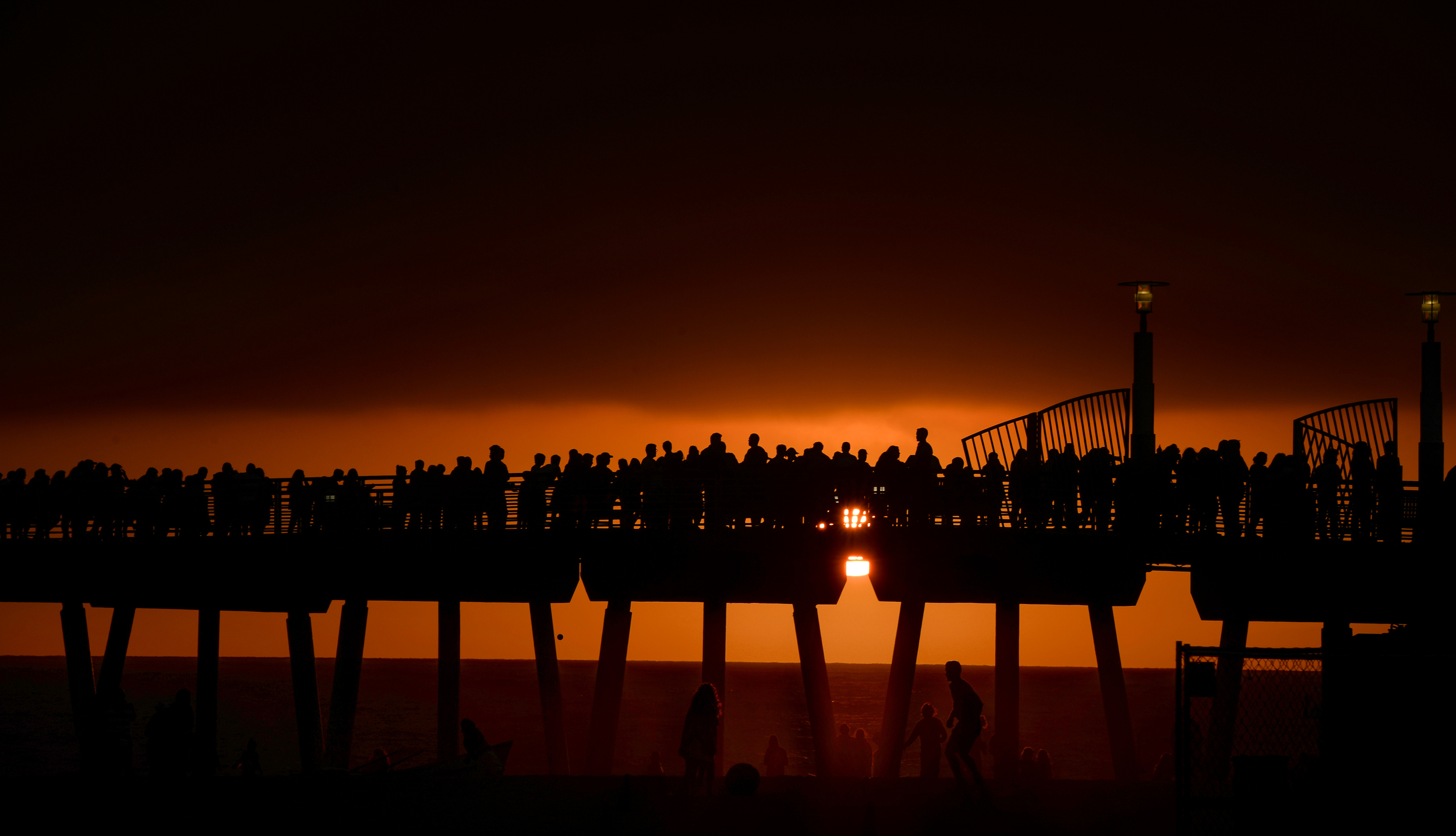  Spectators pack the Hermosa Beach Pier to see the Judge Irving Taplin Medley Relay which includes the Girls Junior Lifeguard Taplin relay, the Boys Junior Lifeguard Taplin relay, Lifeguard Beach Flags and the big event, the Judge Irving Taplin Medle