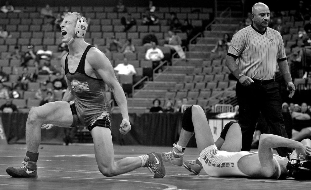  San Marino's Zander Wick celebrates after defeating Santiago's Jeremy Thomas in their 145 pound bout during the CIF SS Masters Wrestling Championship at  Citizens Bank Arena in Ontario, CA. February 28, 2015.  