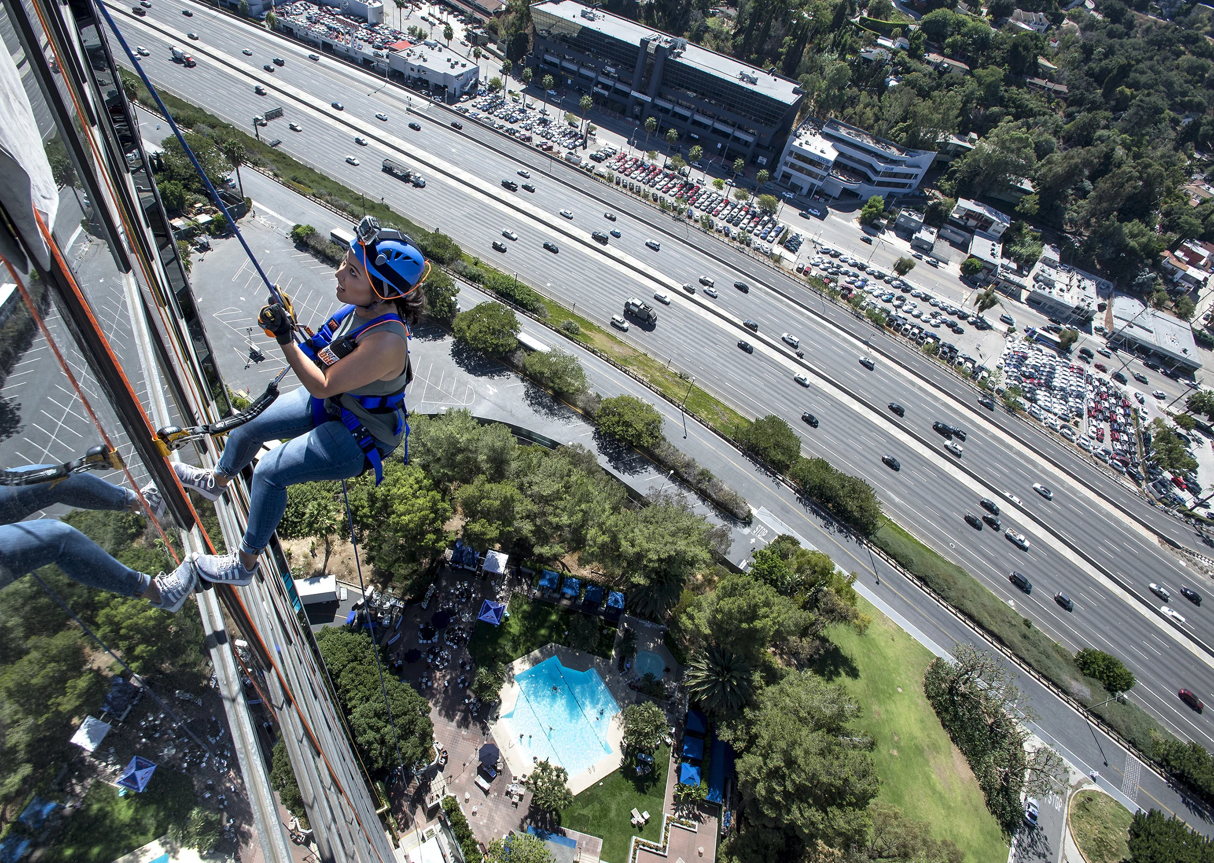 Ruby Olmos, of Santa Clarita, rappels over the edge at the Universal City Hilton Hotel to raise funds for Homes 4 Families in Universal City on Saturday, Oct. 07, 2017. Homes 4 Families' mission is to build resiliency, economic growth, neighborhoods, and homes for veteran families according to press release.