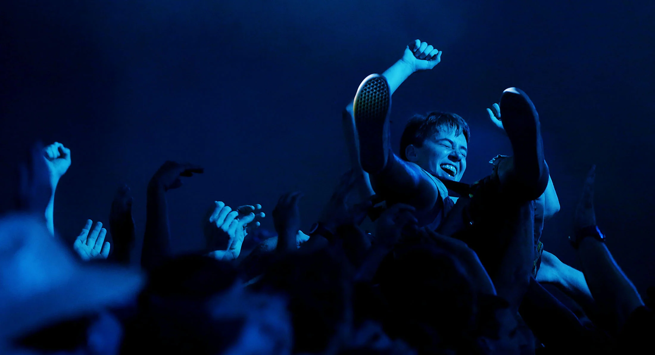 A fan crowd surfs as Dropkick Murphys perform on the main stage at It's Not Dead 2! at Glen Helen Amphitheater Saturday in Devore, CA. August 26, 2017.
