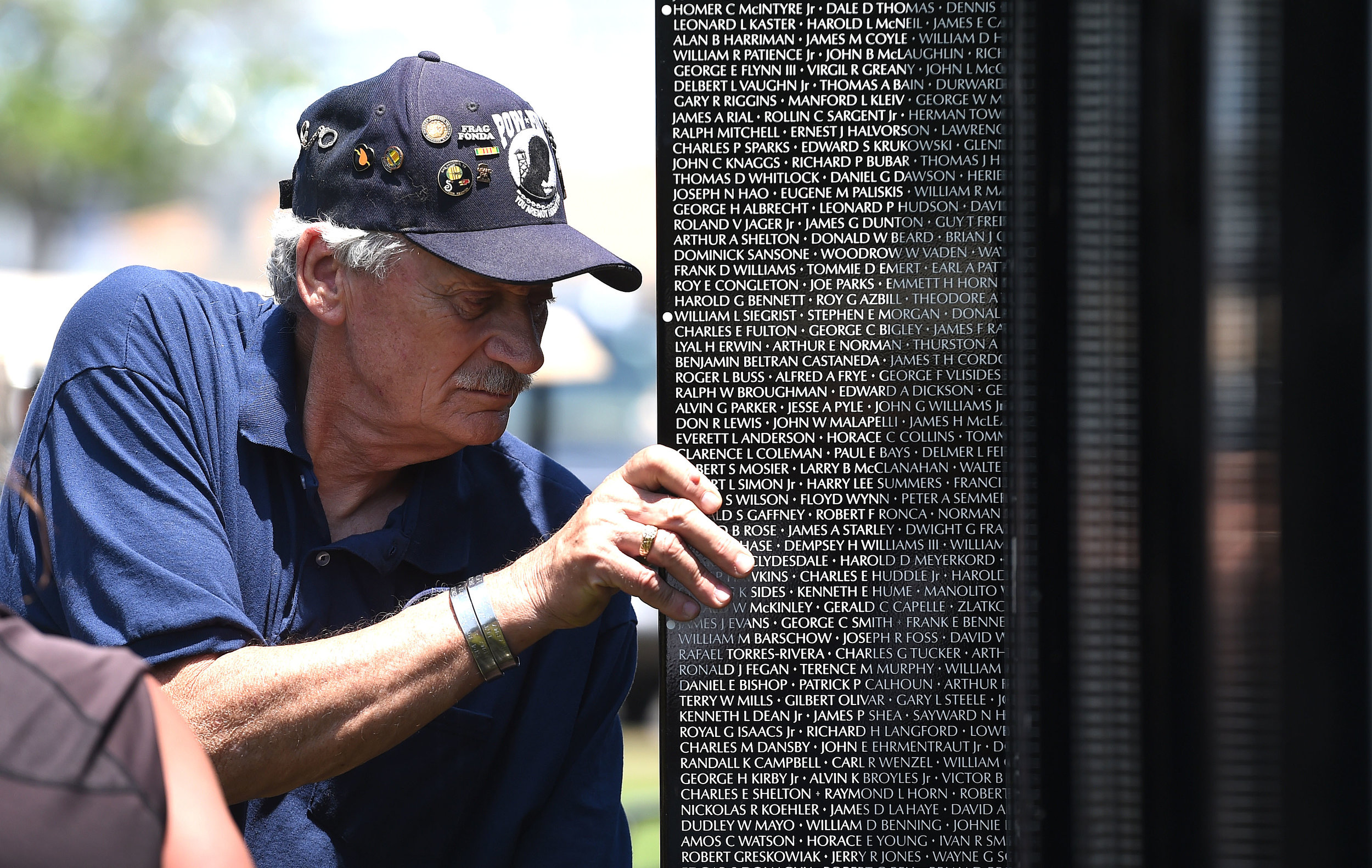  Vietnam Army veteran Steve Mackey, 68 from Jurupa Valley pulls the first panel of the Vietnam Moving Wall out of it's shipping container Thursday at Ayala Park in Bloomington. Volunteers, many being Vietnam veterans, helped construct the Vietnam Mov