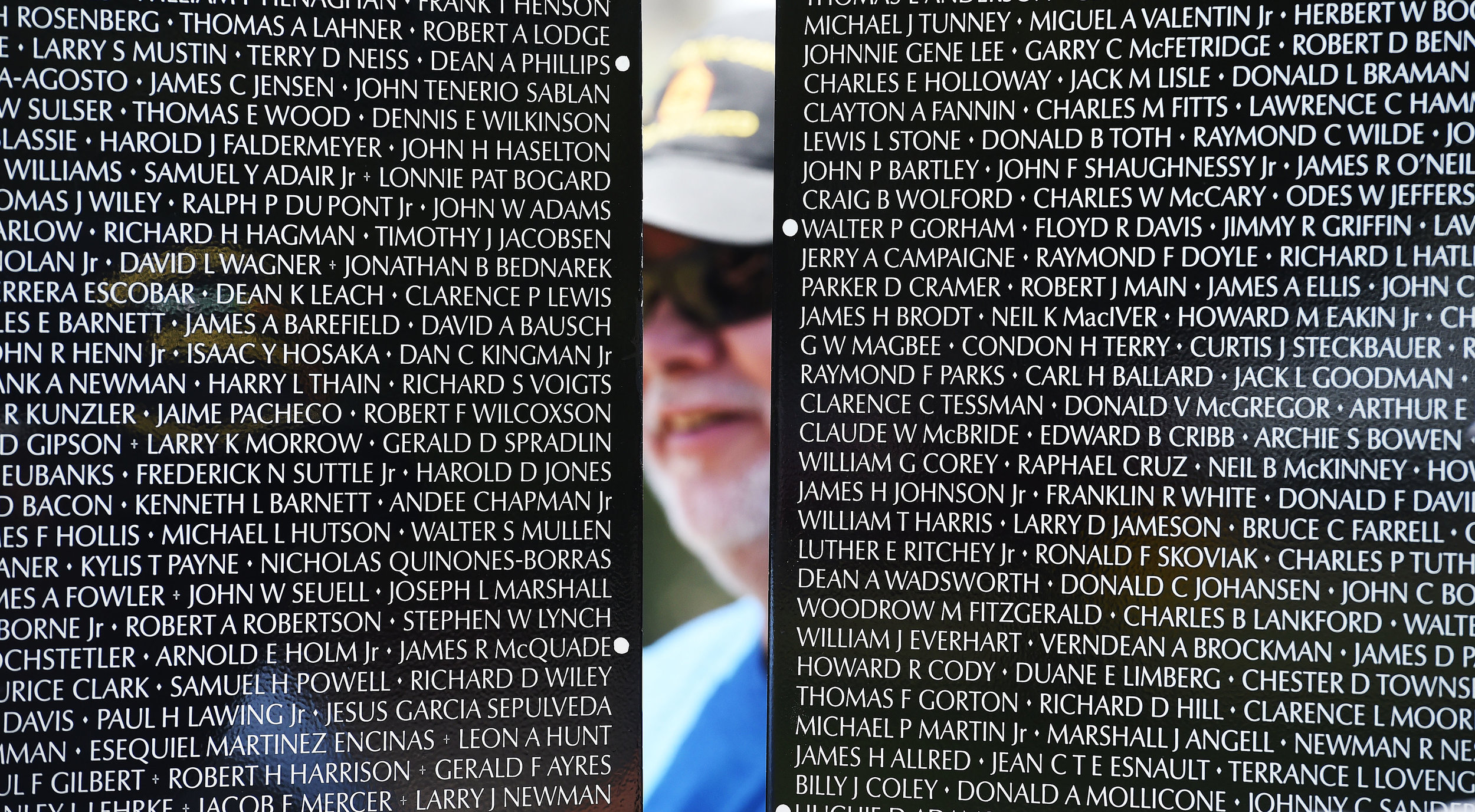  Vietnam Marine veteran Fred Corral, 65 from Rialto, helps install the first two panels of the Vietnam Moving Wall Thursday at Ayala Park in Bloomington. Volunteers, many being Vietnam veterans, helped construct the Vietnam Moving Wall in Ayala Park 