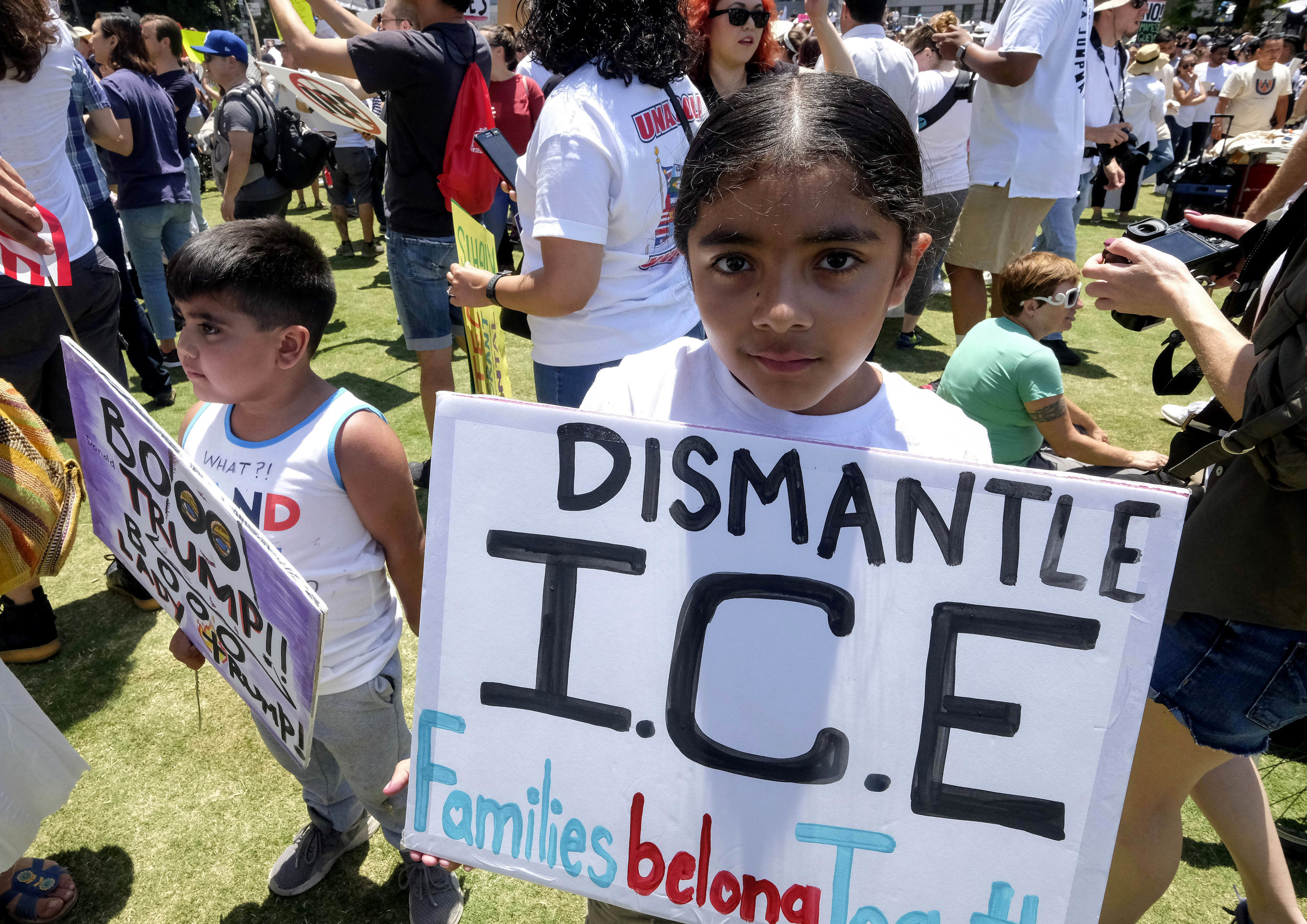  Demonstrators holding signs march against the separation of immigrant families in Los Angeles, the United States, on June 30, 2018. It's one of 600-plus marches to be held across the country to demand an end to separating and detaining families. 