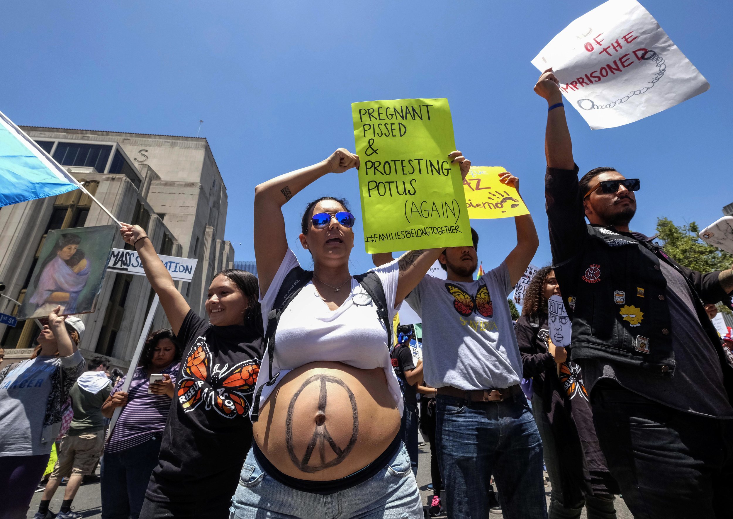  Demonstrators holding signs march against the separation of immigrant families in Los Angeles, the United States, on June 30, 2018. It's one of 600-plus marches to be held across the country to demand an end to separating and detaining families. 