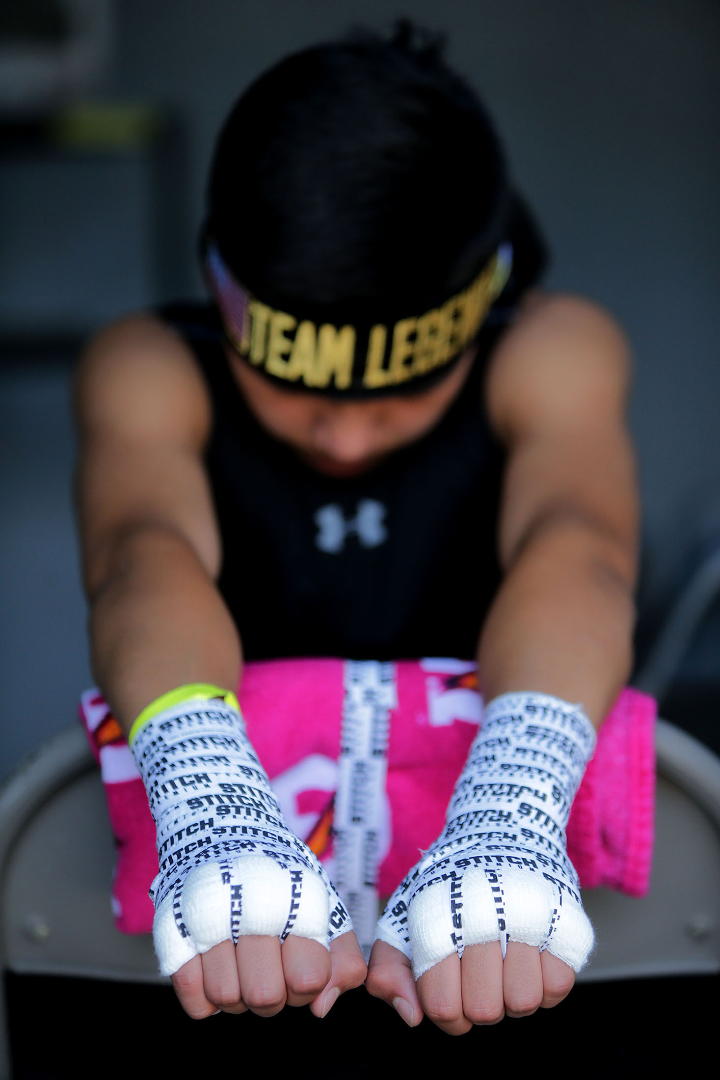  Team Legendz Boxing Club's Jonathan Trevino, 12, of San Jose takes a moment to get his mind set ready is for the first bout of the day during the Future Olympics Champions at  Lake Perris Sports Pavilion in Perris on Saturday, August 18, 2018.   
