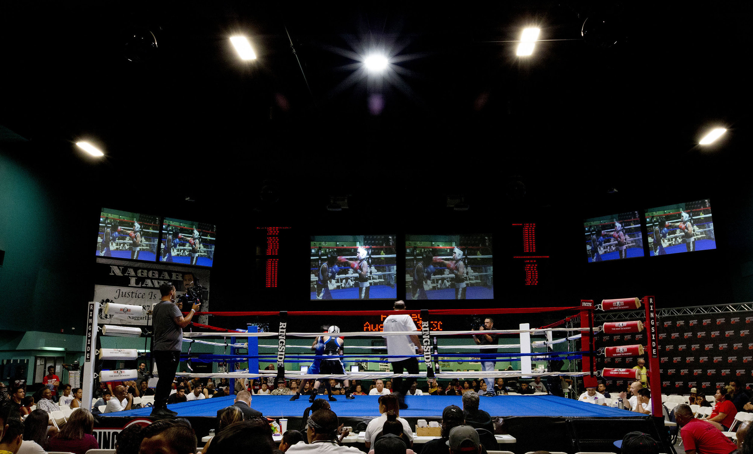  ATR Boxing's Brian Guarded and Colton Community Boxing's Joseph Aramilla box during the Future Olympics Champions at  Lake Perris Sports Pavilion in Perris on Saturday, August 18, 2018.  