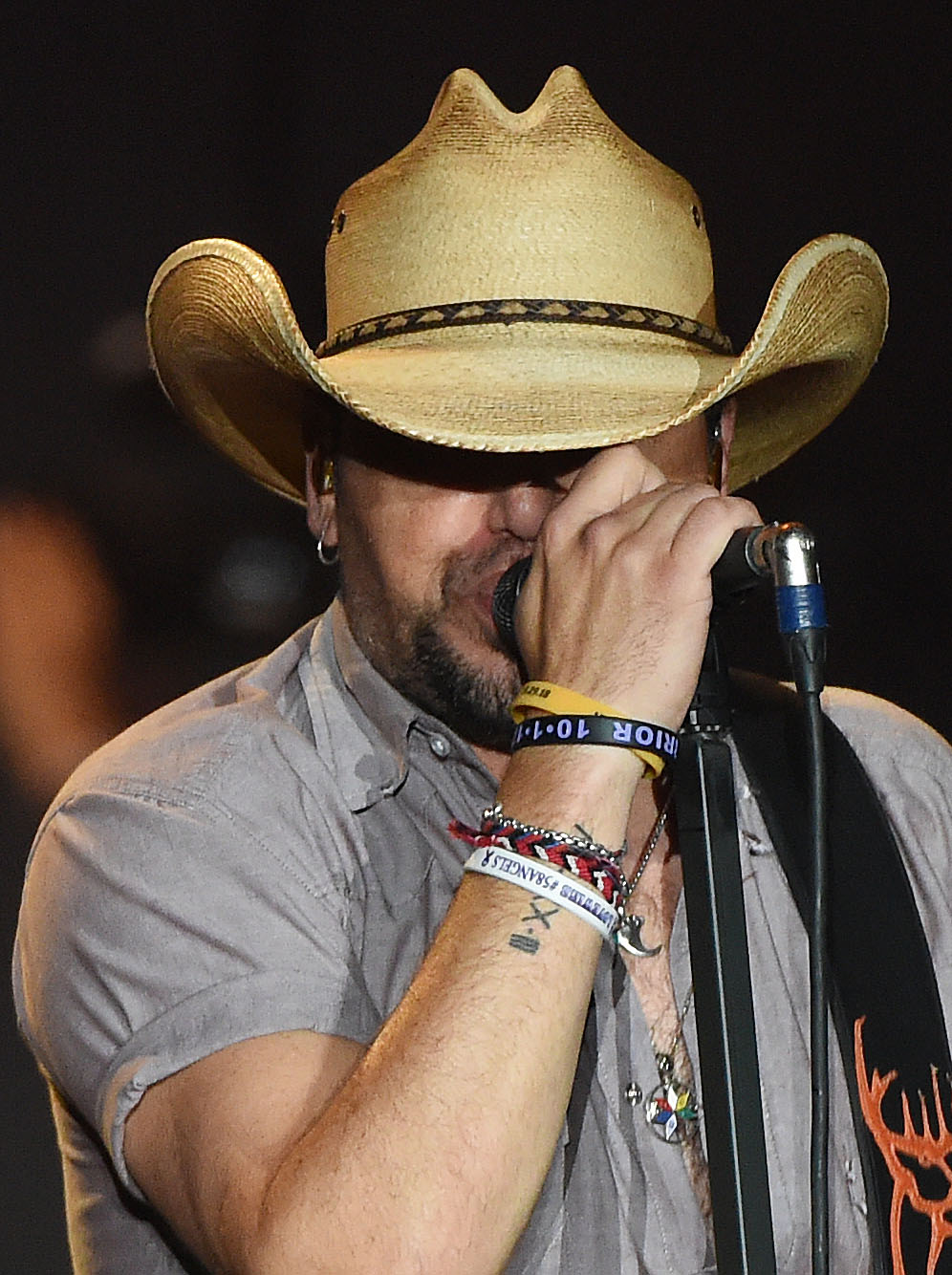  Country music artist Jason Aldean, with a wrist full of Route 91 wrist bands, performs the final show of his High Noon Neon Tour Saturday, September 29, 2018 at FivePoint Amphitheatre in Irvine. Approximately 500 Route 91 survivors attended the show