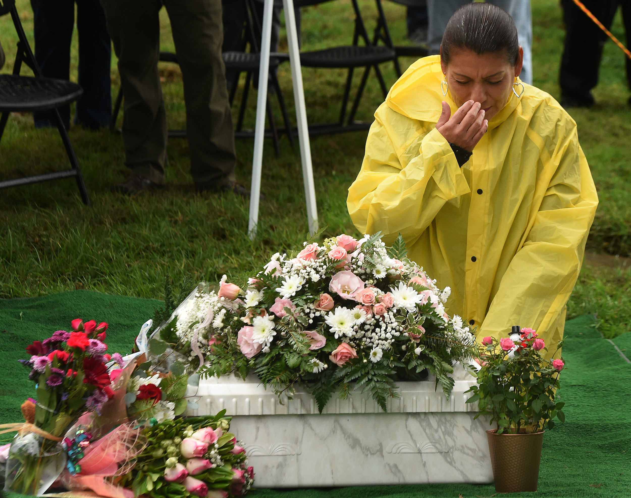  Monica Montejano, from Corona, says The Lords Prayer over the small casket containing the remains of Baby Jane Doe at Sunnyslope Cemetery in Corona, Thursday, December 6, 2018. The newborn infant was found in a cardboard box near the 15 freeway in C