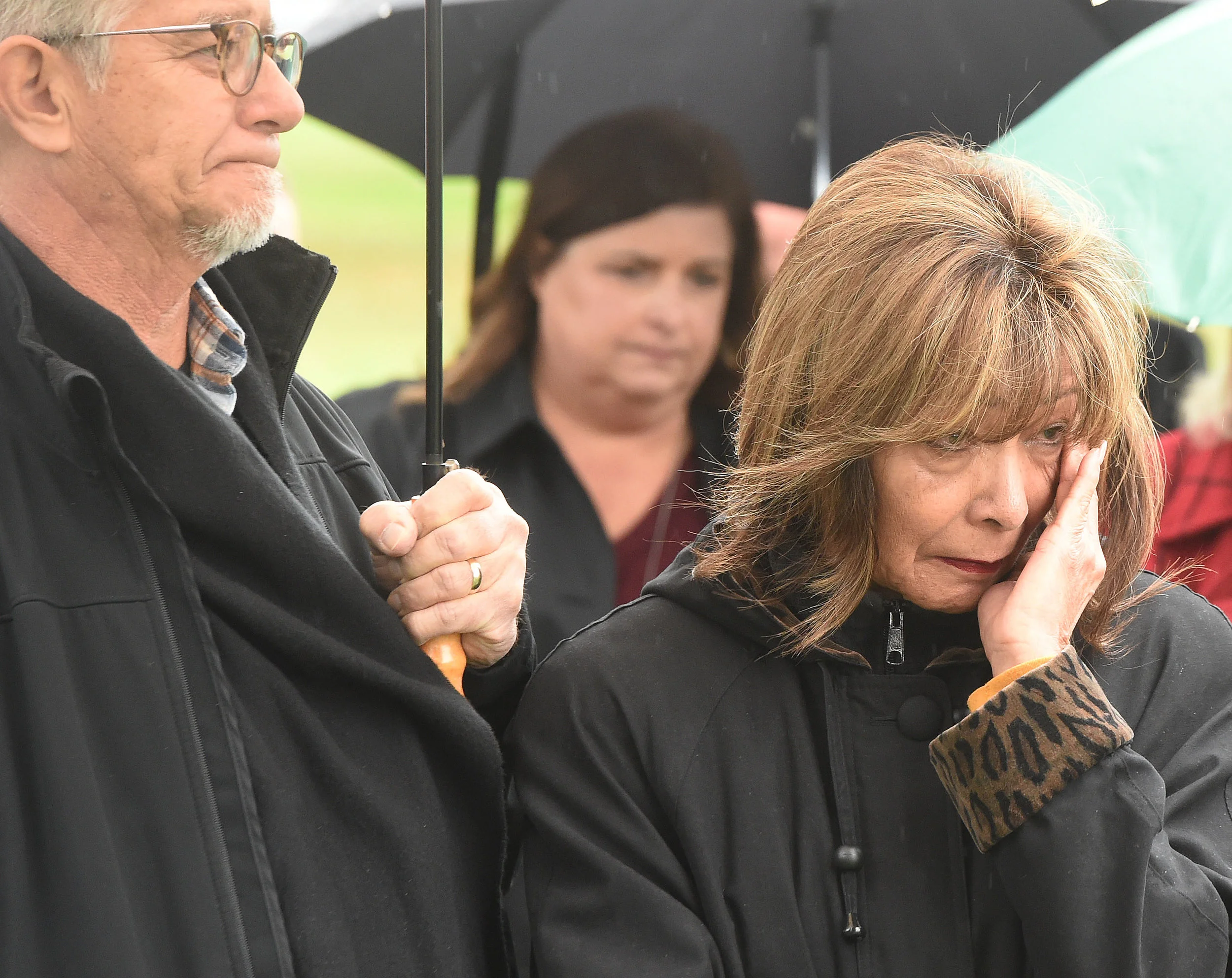  Marilyn Aguillar, from Corona, wipes away tears during the funeral of Baby Jane Doe at Sunnyslope Cemetery in Corona, Thursday, December 6, 2018 as her husband Benjamin stands next to her. The newborn infant was found in a cardboard box near the 15 