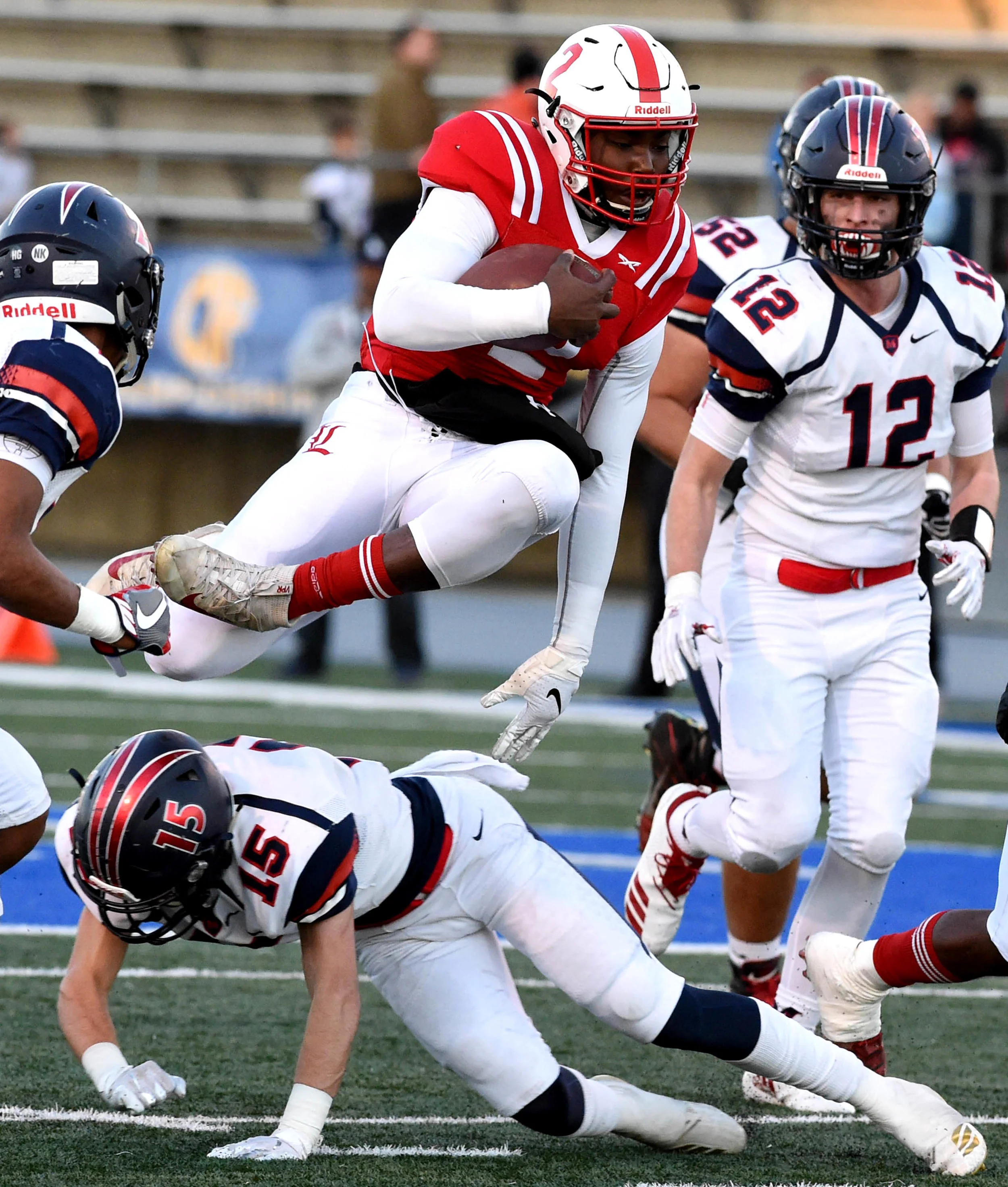  Jalon Daniels #2 of Lawndale leaps for first down against San Joaquin Memorial in the first half of a CIF State Division 2 A Championship football game at Cerritos College on Saturday, December 15, 2018 in Norwalk, California.  
