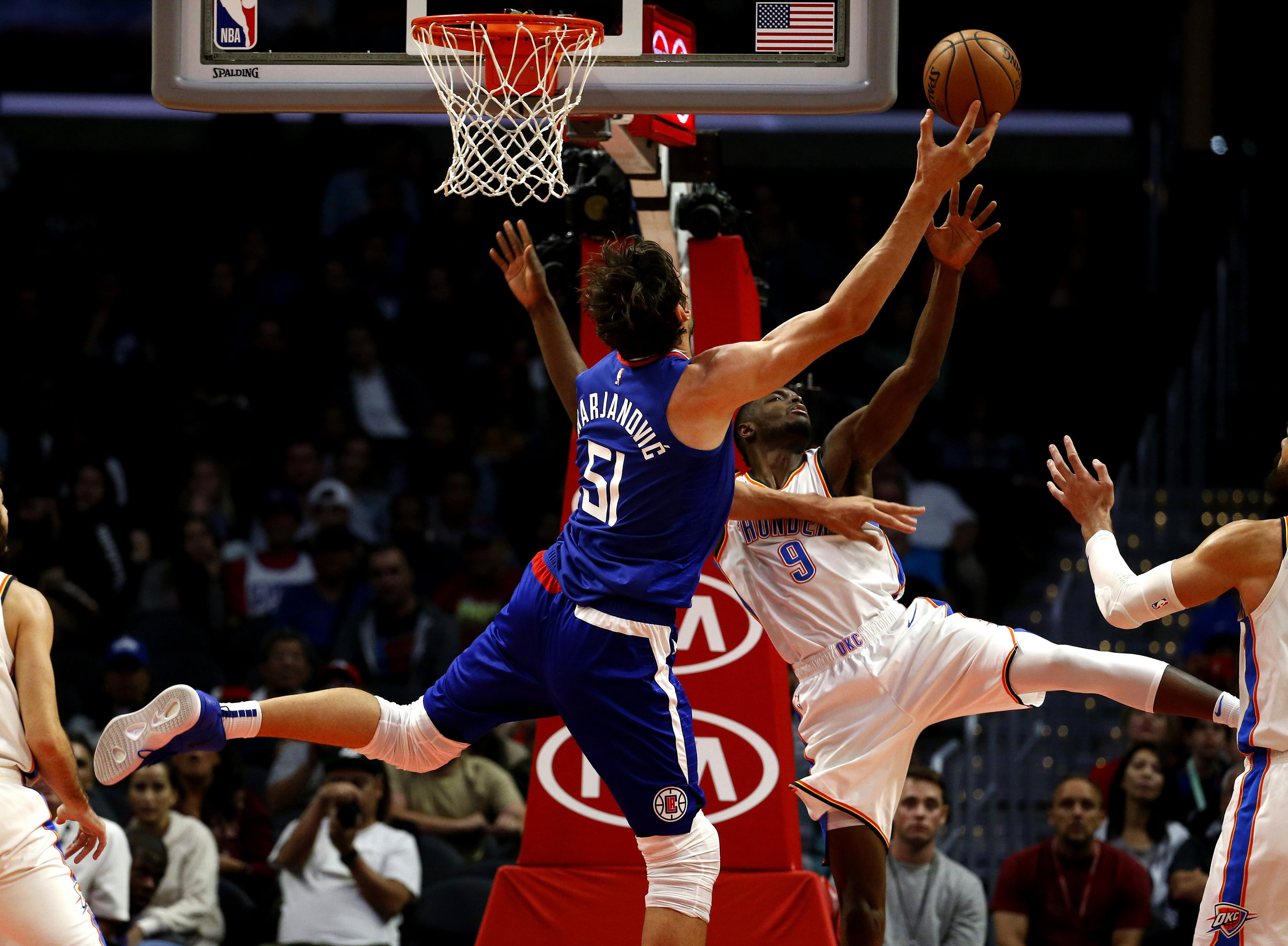  Los Angeles Clippers’ Boban Marjanovic (51) goes up to the basket agains Oklahoma City Thunder’s Jerami Grant (9) during the second half of an NBA basketball game Friday, Oct. 19, 2018, in Los Angeles. Clipper won 108-92.  