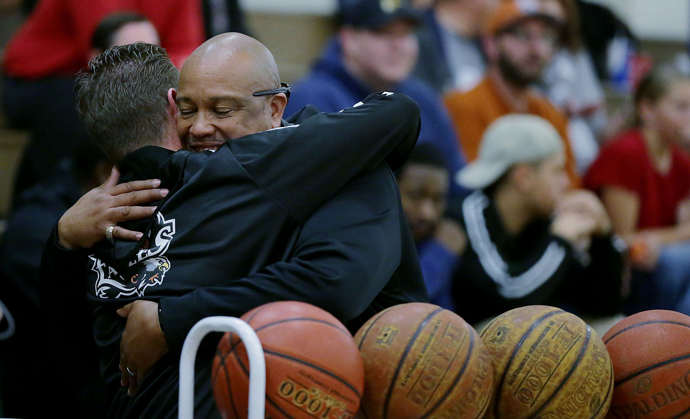 La Sierra boys basketball coach Justin Norman got hugs all night long from fans and supporters after his wife, Meagan, who's sudden death 10 days ago shocked the La Sierra sporting family in Riverside on Friday, January 11, 2019.