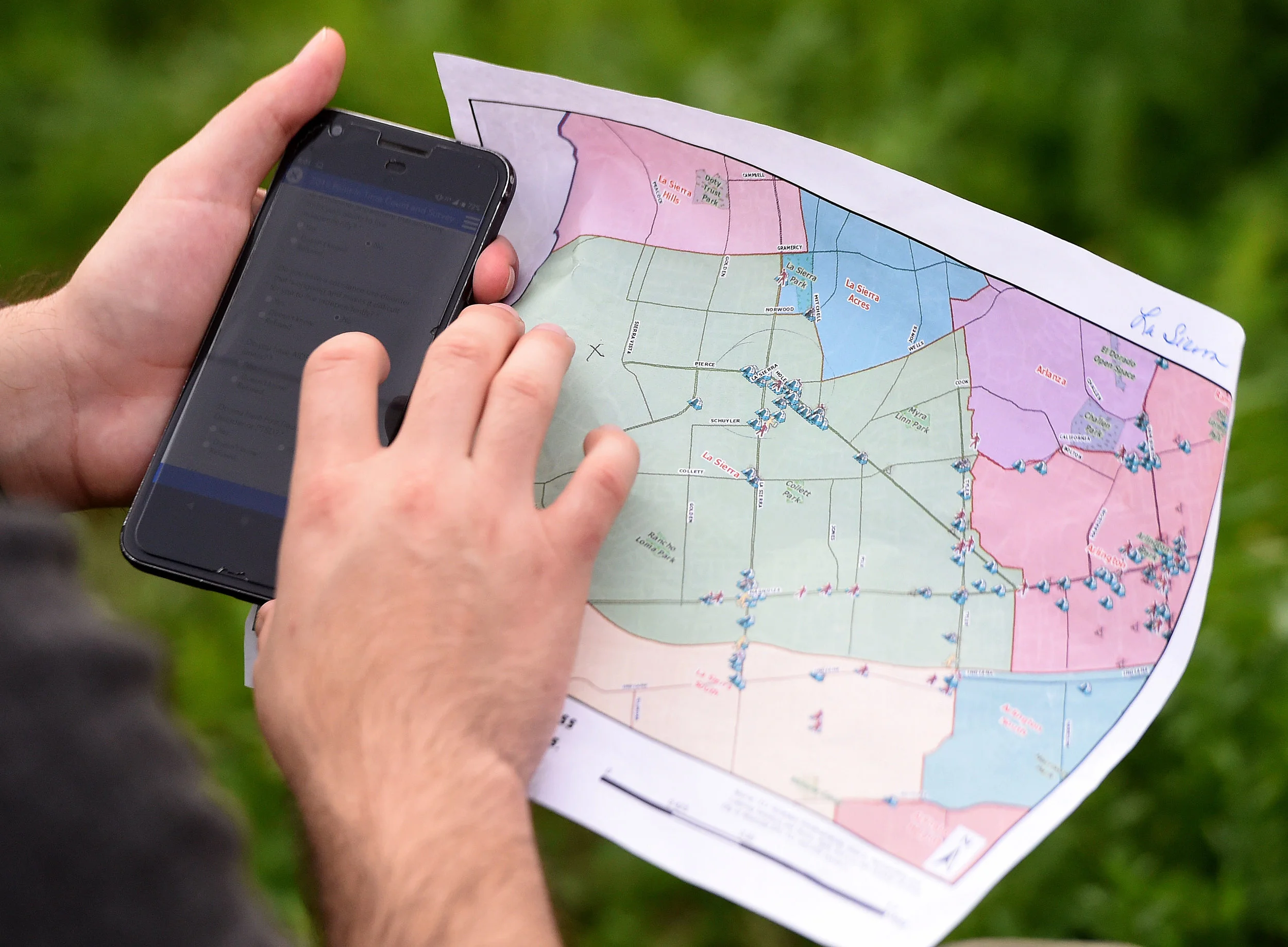  Point-in-Time Homeless Count and Survey volunteer Josue Reynaga uses a special phone app to submit data of a homeless man in Riverside Tuesday morning, January 29, 2019. Over 700 volunteers took part in the county wide count using a specially design