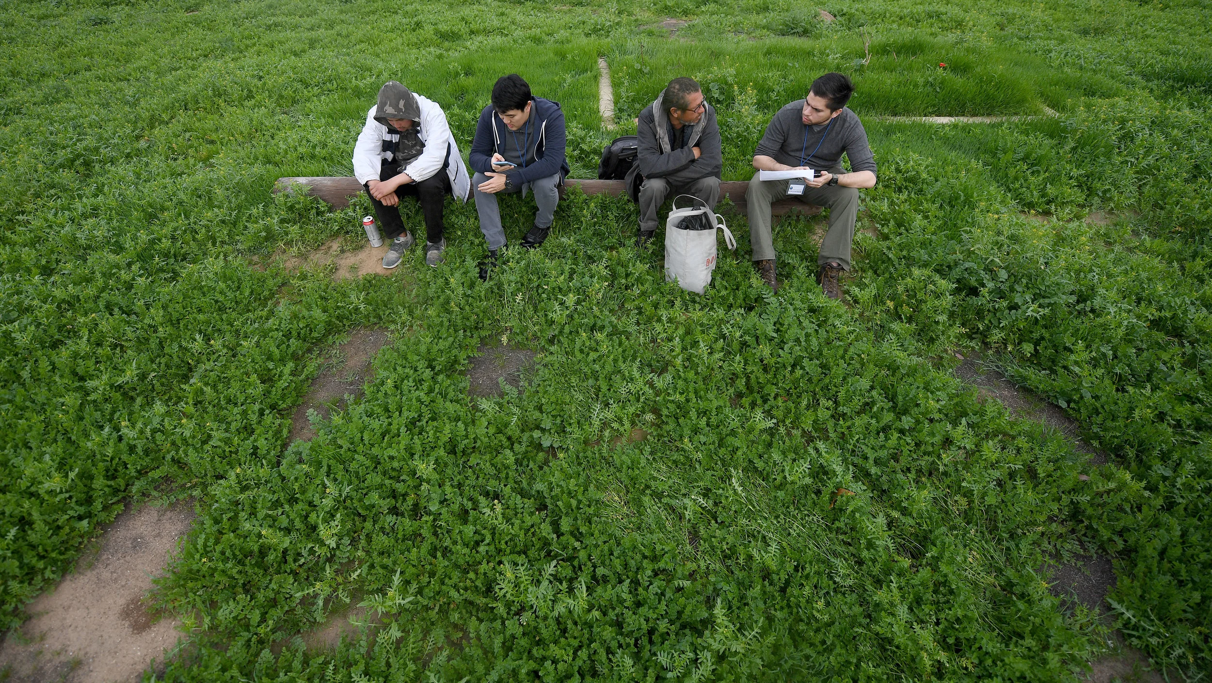  Procopio Hernandez, 21, and has been living on the streets for 4 years, has his information collected by Jonathan Phan, while Enrique Montano, 46, and living on the streets for the past 6 months, has his information collected by volunteer Josue Reyn