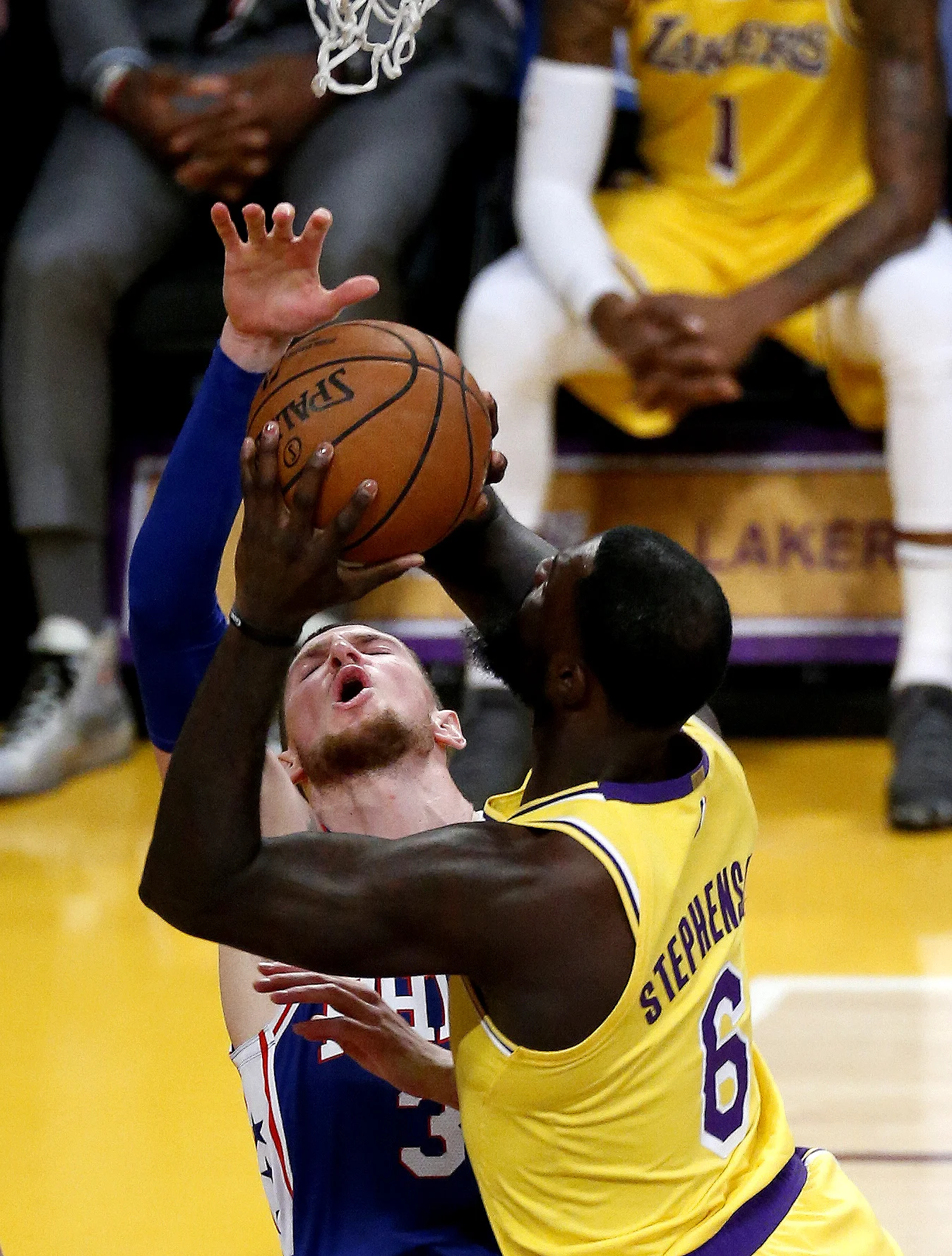  Philadelphia 76ers' Mike Muscala (31) defends as  Los Angeles Lakers’ Lance Stephenson (6) shoots during an NBA basketball game, Jan. 29, 2019, in Los Angeles. 