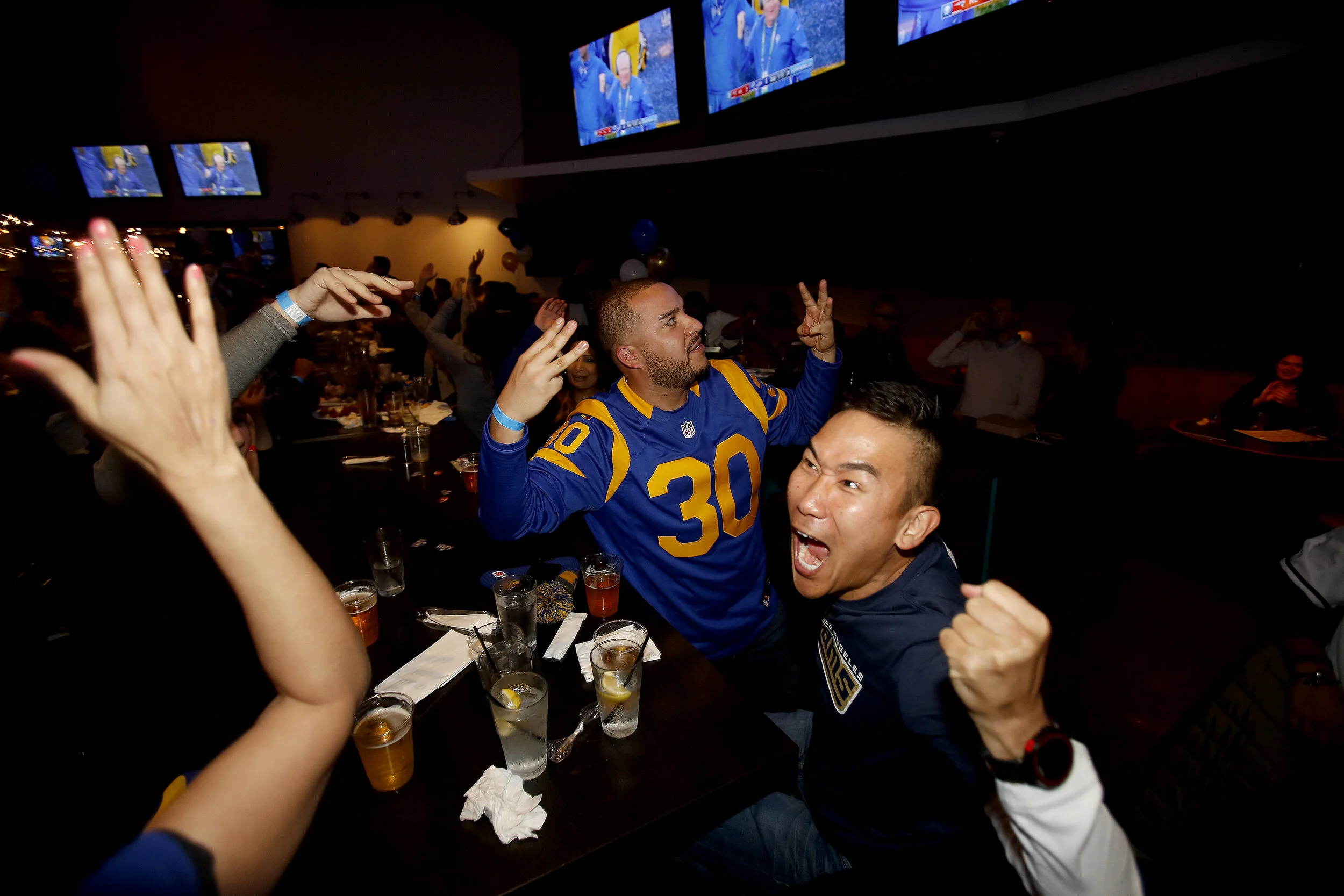  Fans reacts during a viewing party for the Super Bowl 53 football game between the New England Patriots and the Los Angeles Rams in Los Angeles, Sunday, Feb. 3, 2019. 
