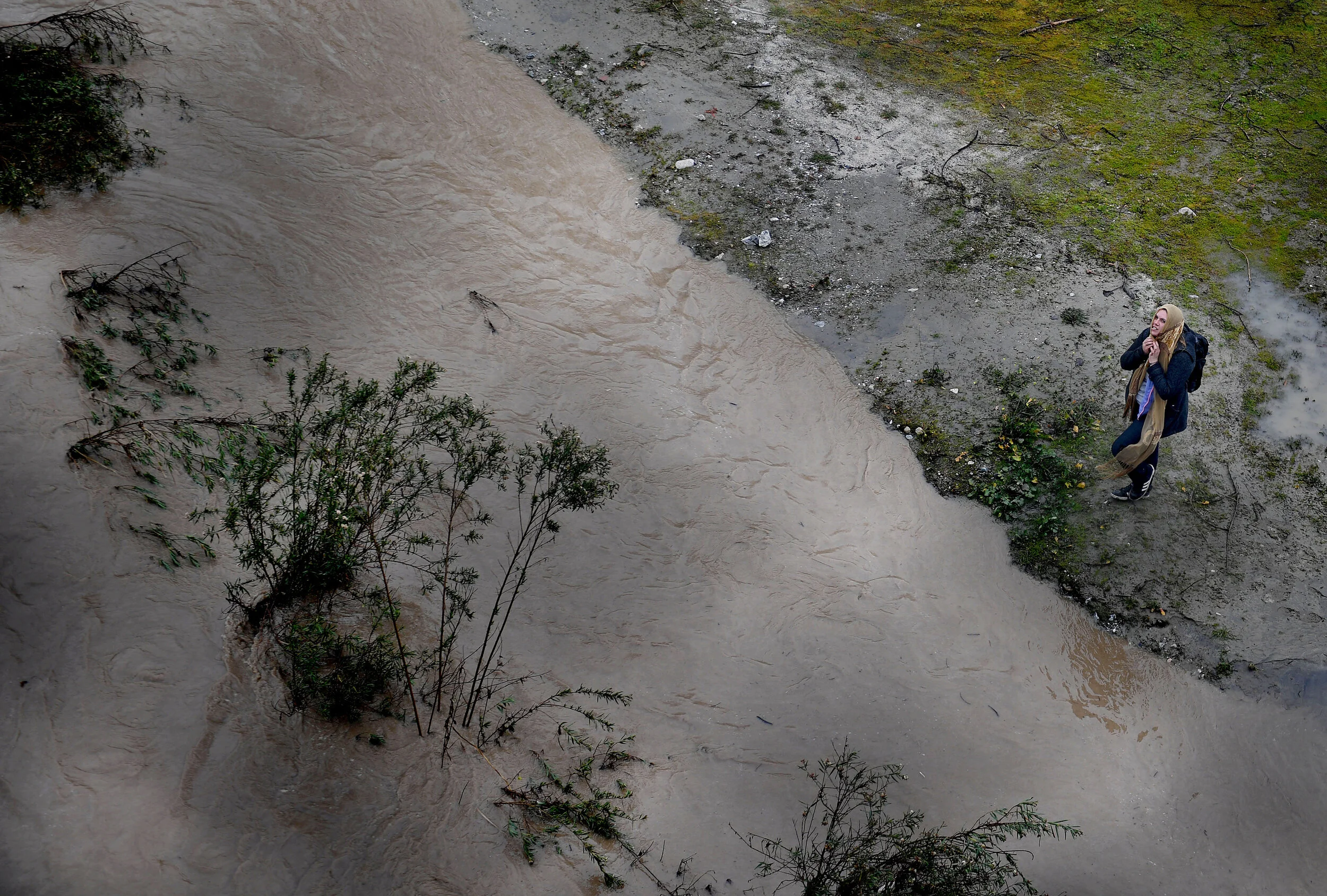  A San Bernardino County Fire swift rescue team rescued 8 individuals stranded on an island in the rain swollen Santa Ana River bed Thursday, February 14, 2019.  