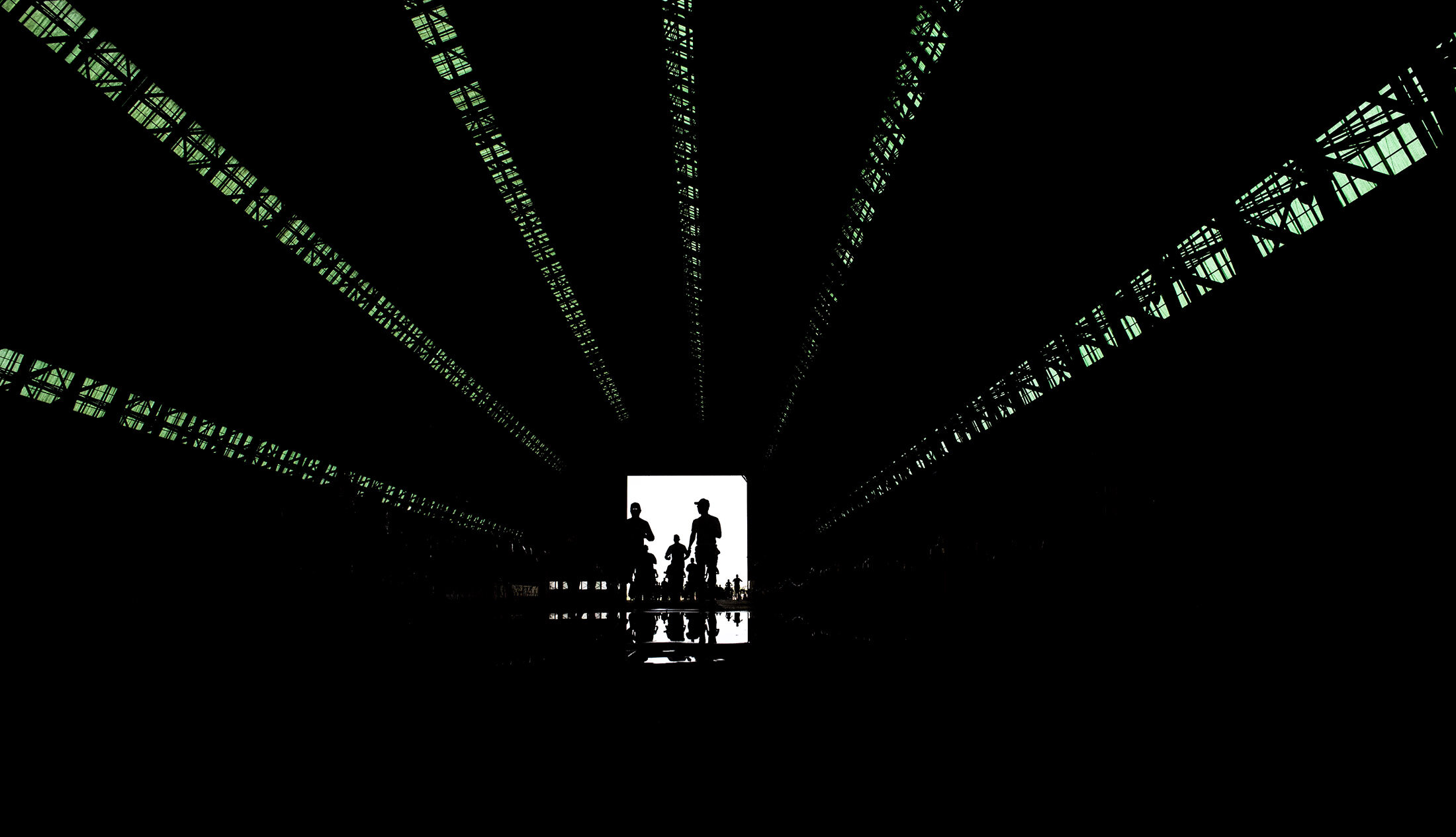 Tustin Hangar Half Marathon and 5k runners make their way inside the cavernous 17-story historic structure, rarely open to the public on Sunday, March 3, 2019.