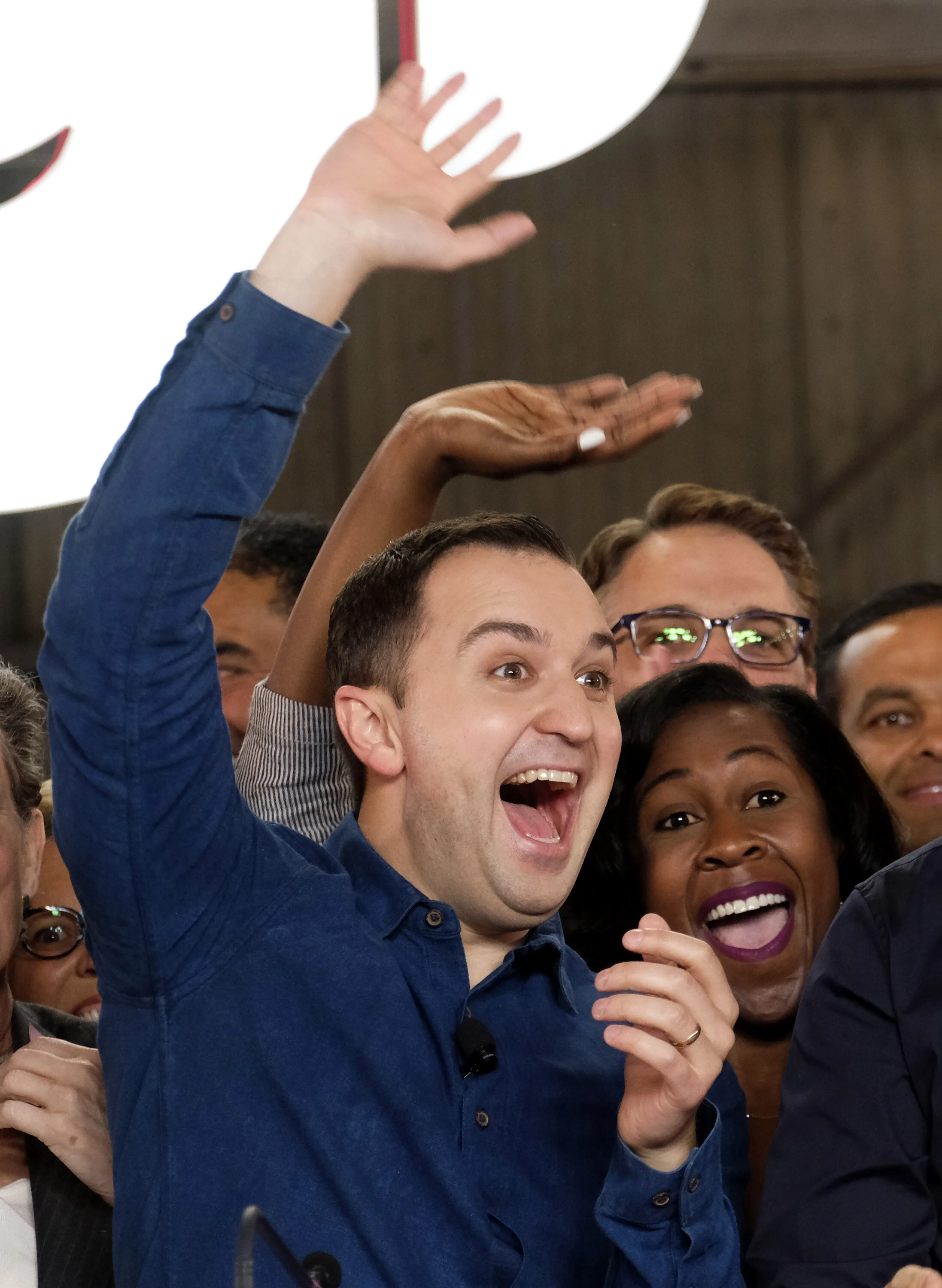  Lyft co-founders John Zimmer, cheers as he rings a ceremonial opening bell in Los Angeles, Friday, March 29, 2019. On Friday the San Francisco company's stock will begin trading on the Nasdaq exchange under the ticker symbol "LYFT." 
