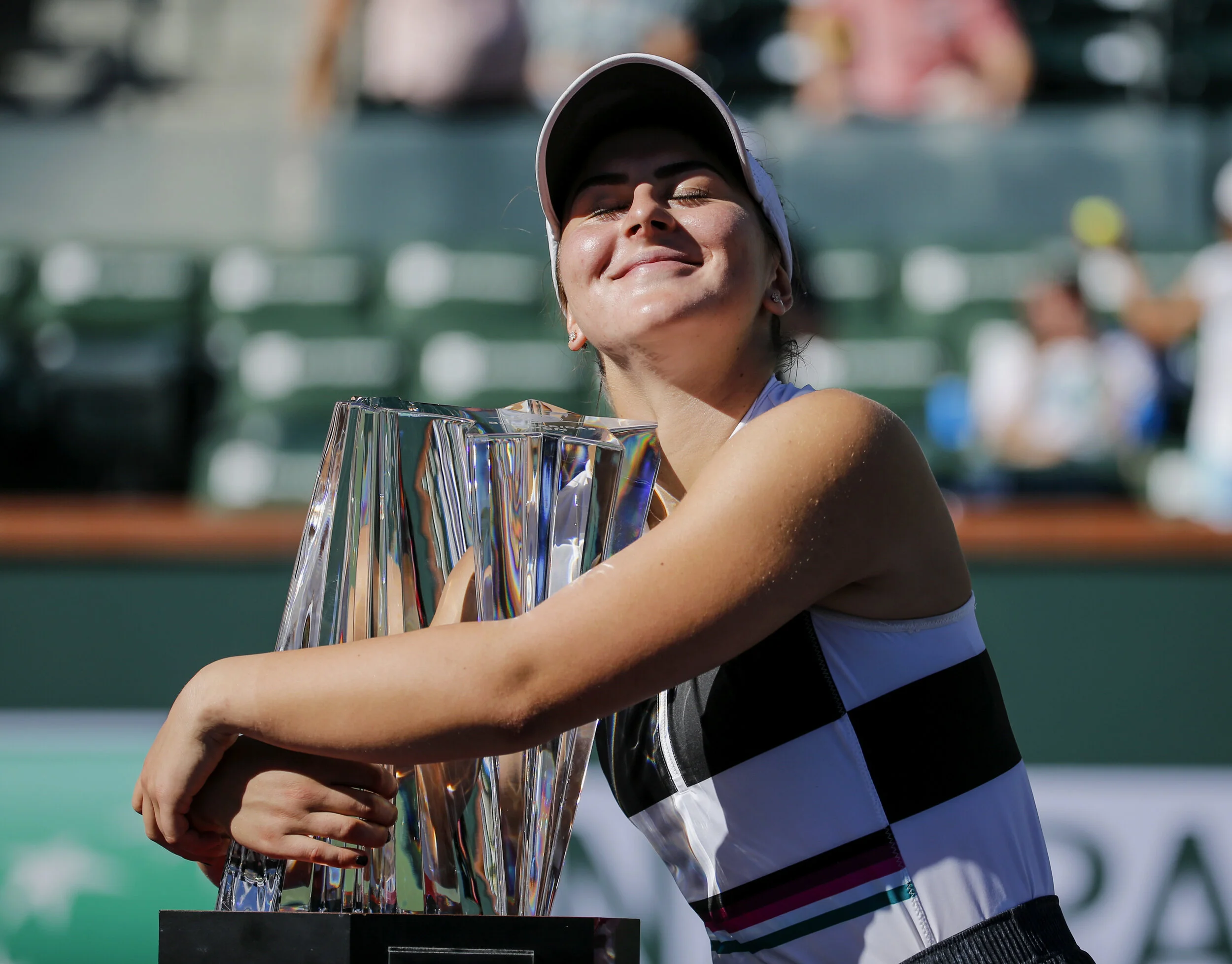  Bianca Andreescu of Canada, poses with her trophy after defeating Angelique Kerber of Germany, to win the women singles final match of the BNP Paribas Open tennis tournament on Sunday, March 17, 2019 in Indian Wells, California, the United States.  
