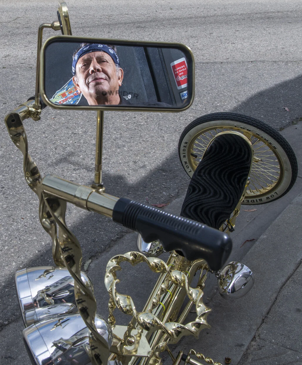  Manny Silva, 72, is reflected in a bike mirror on one of the lowrider bikes that he made in Compton Monday, April 1, 2019. Silva started the lowrider bike craze in the 1970s as he is known as the Ògodfather of the lowrider bikesÓ.  