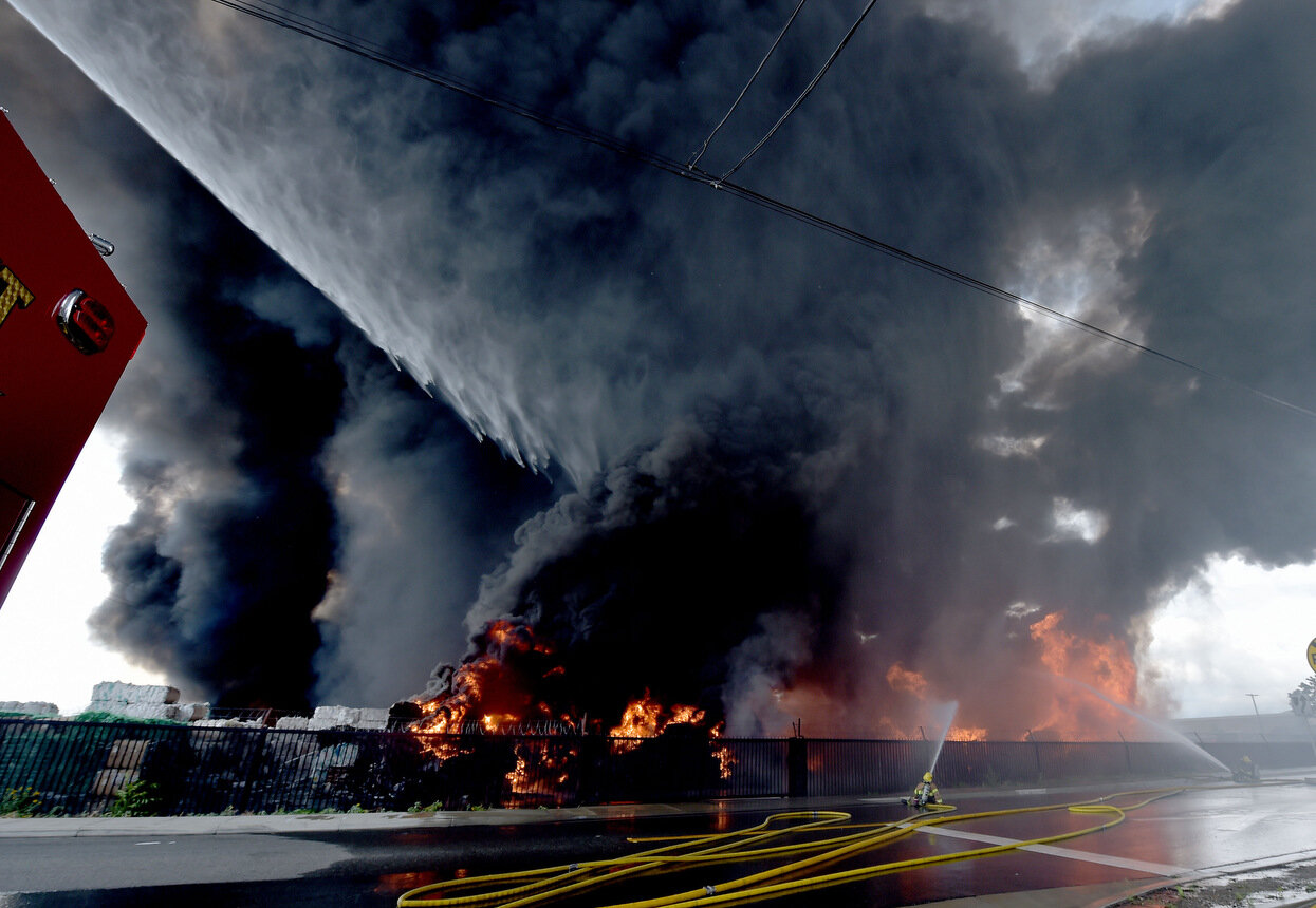  Ontario firefighters, along with assistance from other cities, work on a multi alarm fire at a recycling facility on State Street in Ontario Tuesday April 30, 2019. The cause of the blaze is under investigation, which has caused the closure of railr