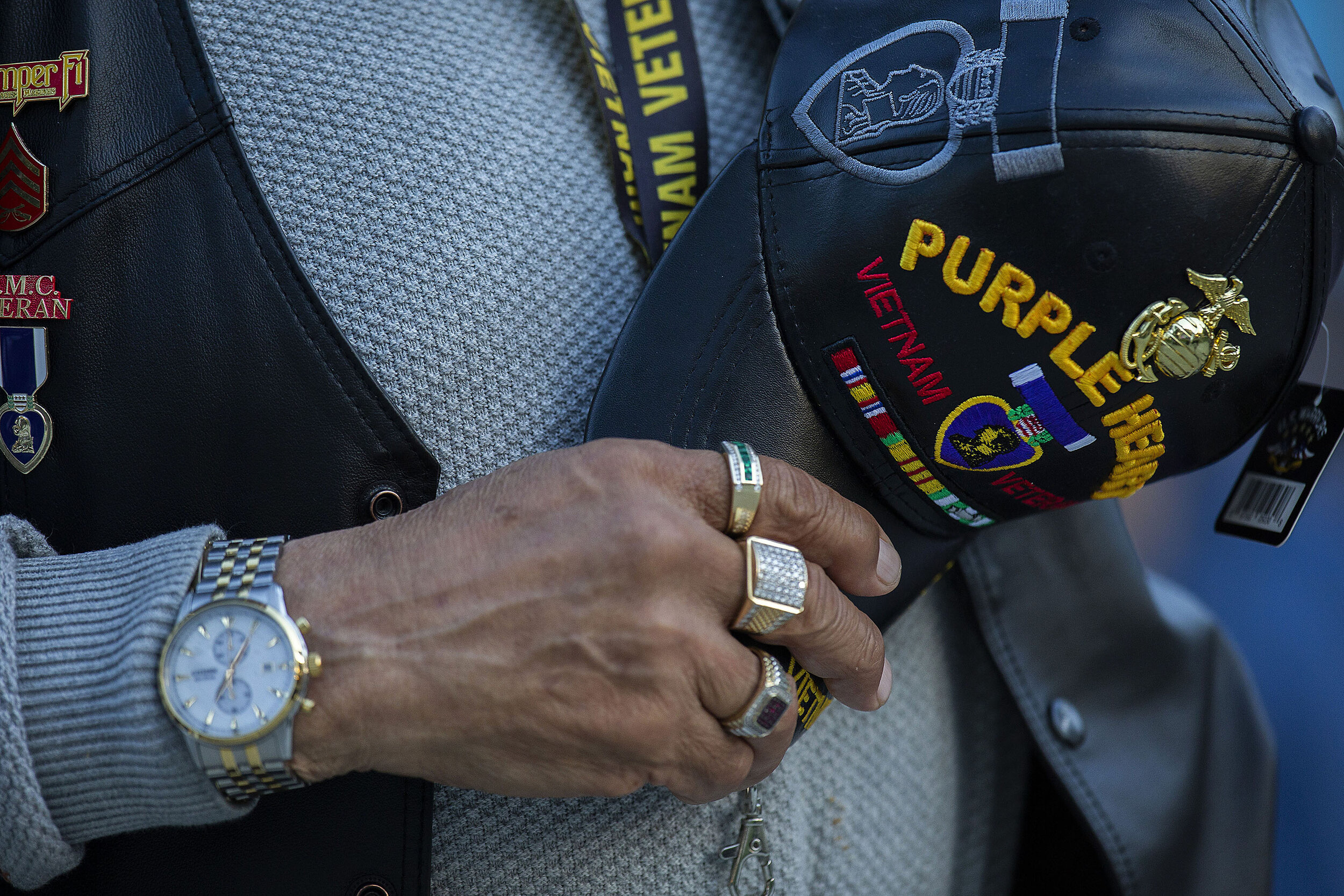 Vietnam veteran 67-68, James Aguilar, 73, holds his Purple Heart hat over his heart as the Marine Corp hymn is played during Festival Concert Salute to the Troops as part of the Redlands Festival of Arts Redlands Bowl in Redlands on Friday, May 24,