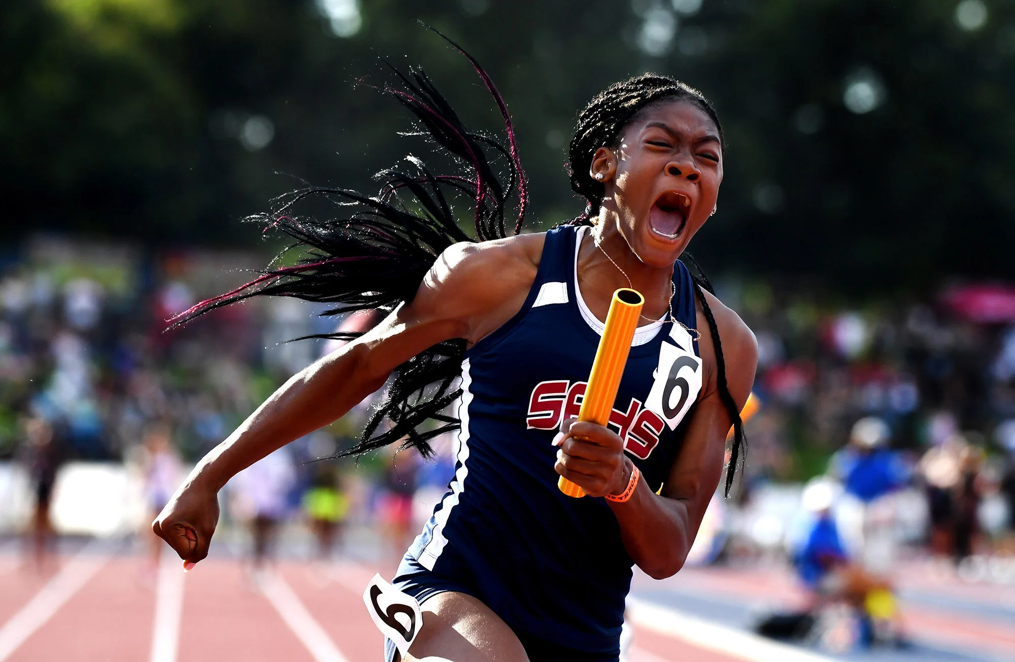  Aaliyah McCormick of Scripps reacts as she runs the anchor leg and wins the 4x100 relay during the CIF State Track and Field Championships at Buchanan High School on Saturday, May 25, 2019 in Clovis, California.  