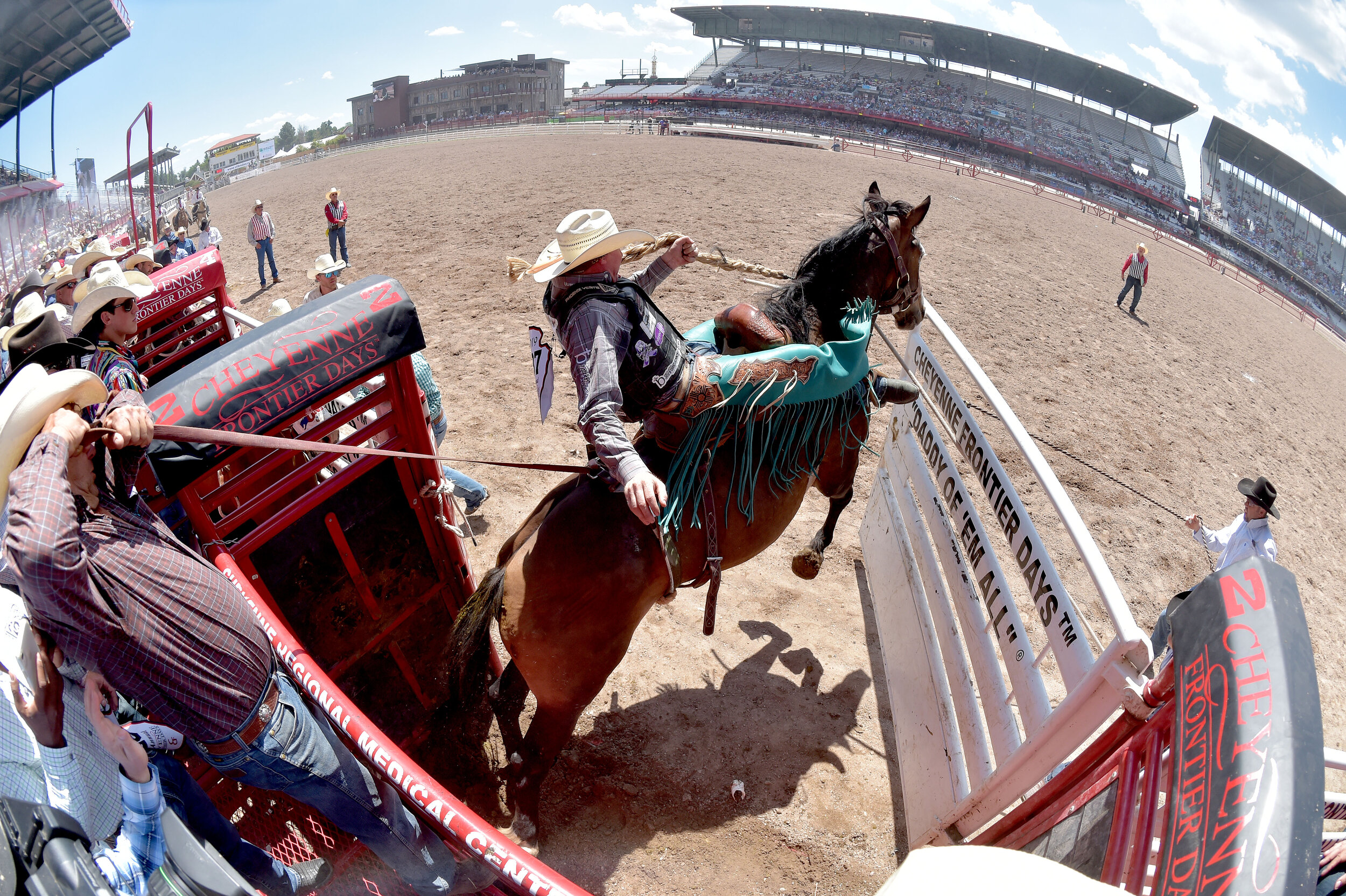  Taos Muncy blasts out of the bucking chutes during the Saddle Bronc riding event Tuesday July 23, 2019 during the 123rd Cheyenne Frontier Days rodeo in Cheyenne, Wyoming. 