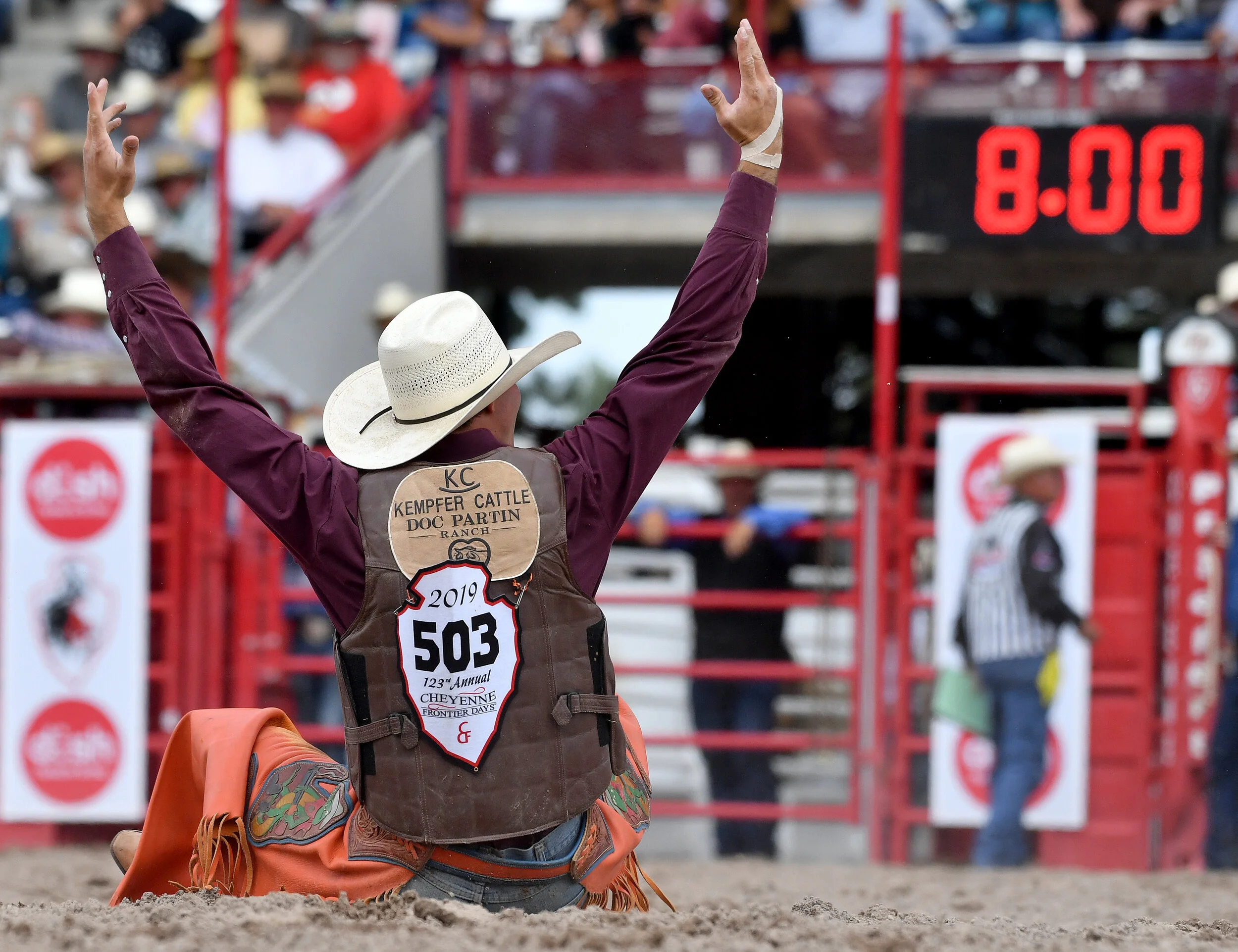 Parker Kempfer, from Melbourne, Florida, reacts to the crowd after completing his 8 second ride during the Saddle Bronc riding event Monday July 22, 2019 during the 123rd Cheyenne Frontier Days Rodeo in Cheyenne, Wyoming.  