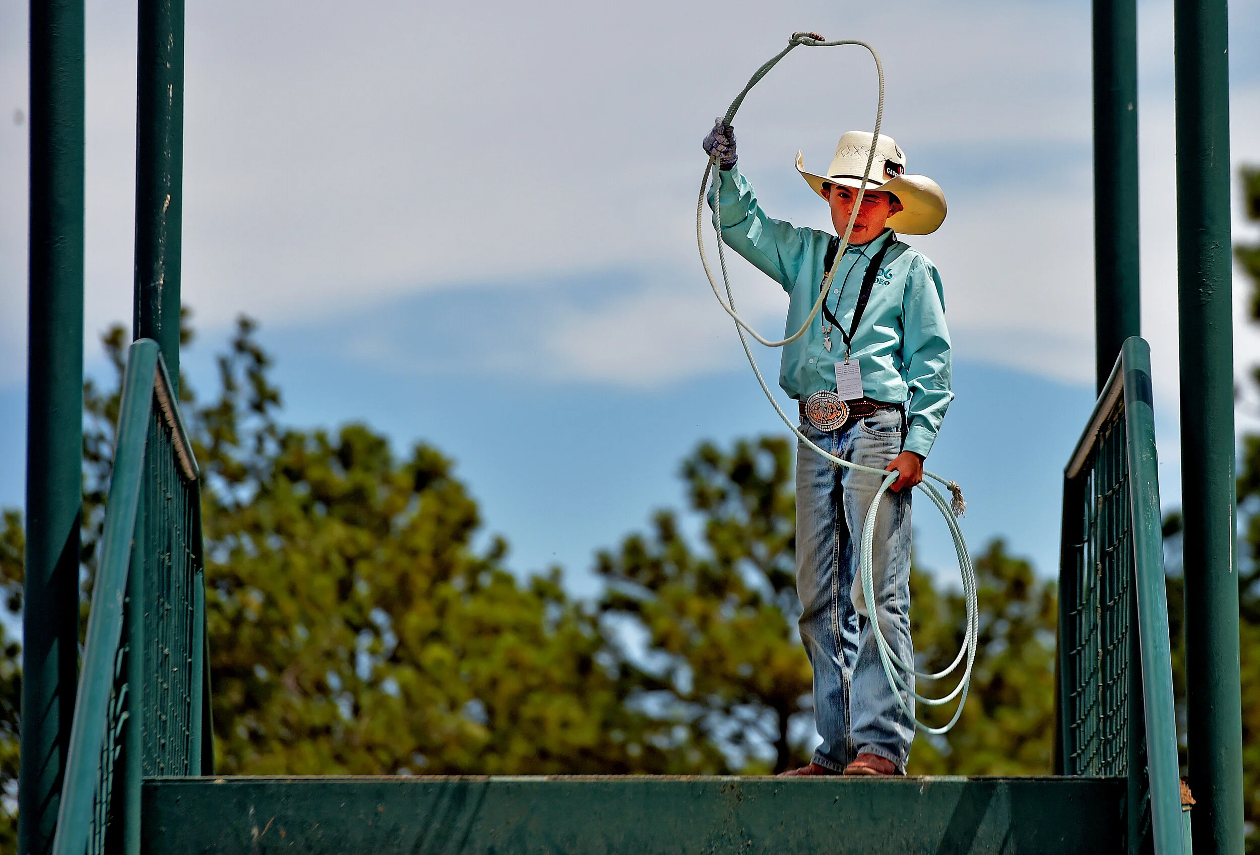  Rodee DeMers, 10, from Phillipsburg, Montana, practices his roping skills on a pedestrian bridge Thursday July 25, 2019 at the 123rd Cheyenne Frontier Days Rodeo in Cheyenne, Wyoming.  