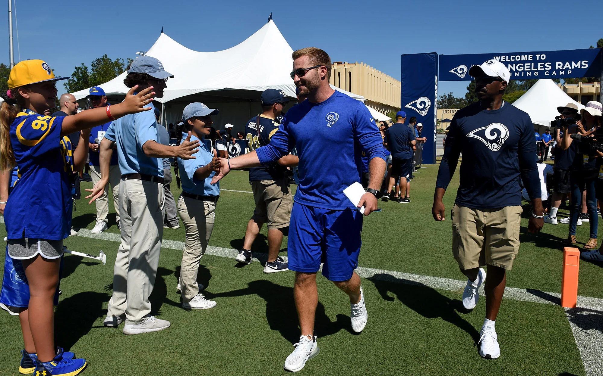  Head coach Sean McVay of the Los Angeles Rams enters the field during the Los Angeles Rams training camp on the campus of UC Irvine on Saturday, July 27, 2019 in Irvine, California.  