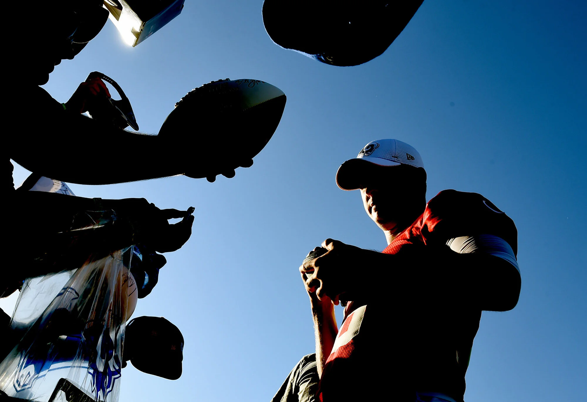  Quarterback Jared Goff #16 of the Los Angeles Rams signs autographs during the Los Angeles Rams training camp on the campus of UC Irvine on Saturday, July 27, 2019 in Irvine, California.  